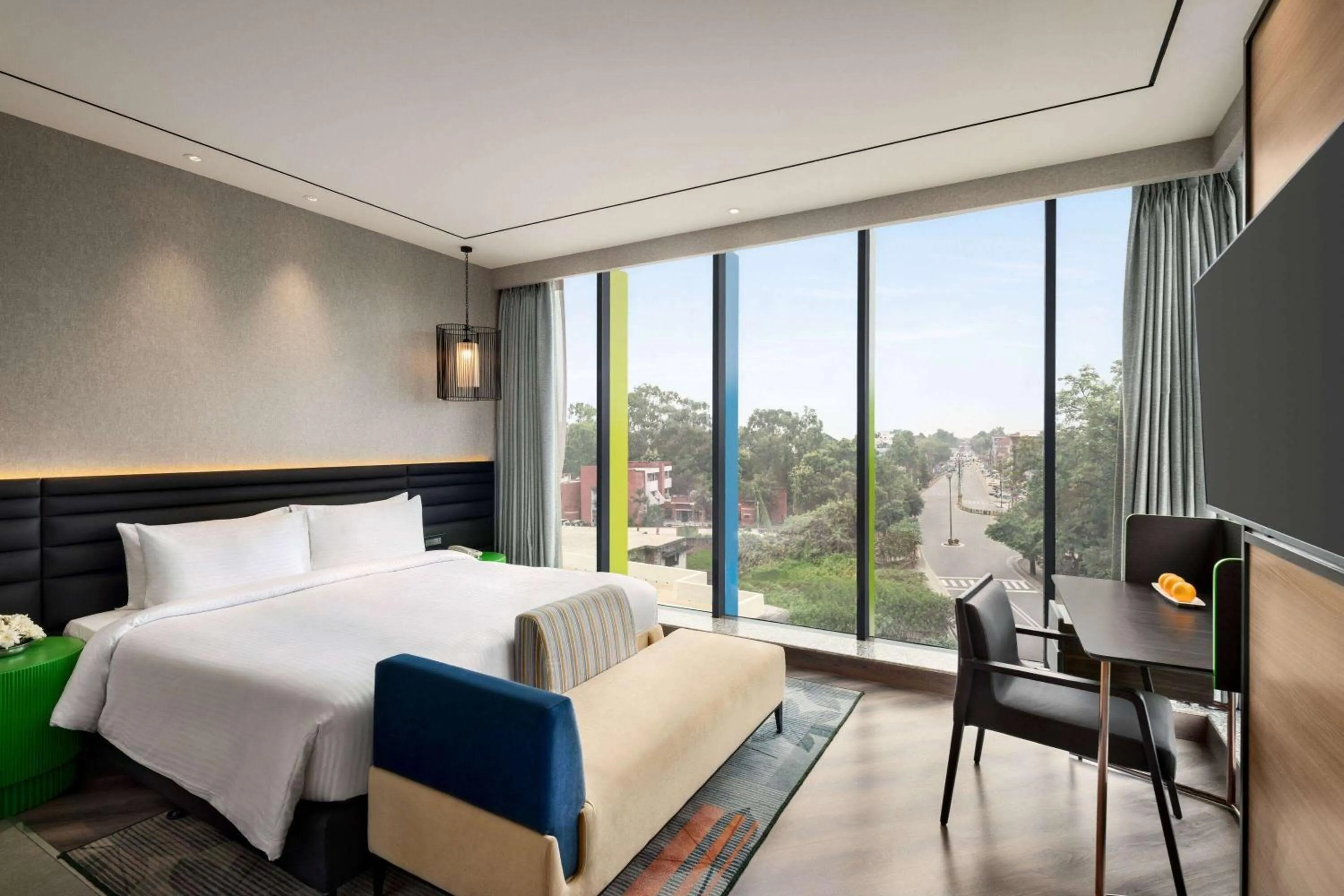 Photo of the whole room, Bed in Ramada Encore by Wyndham Bareilly Civil Lines