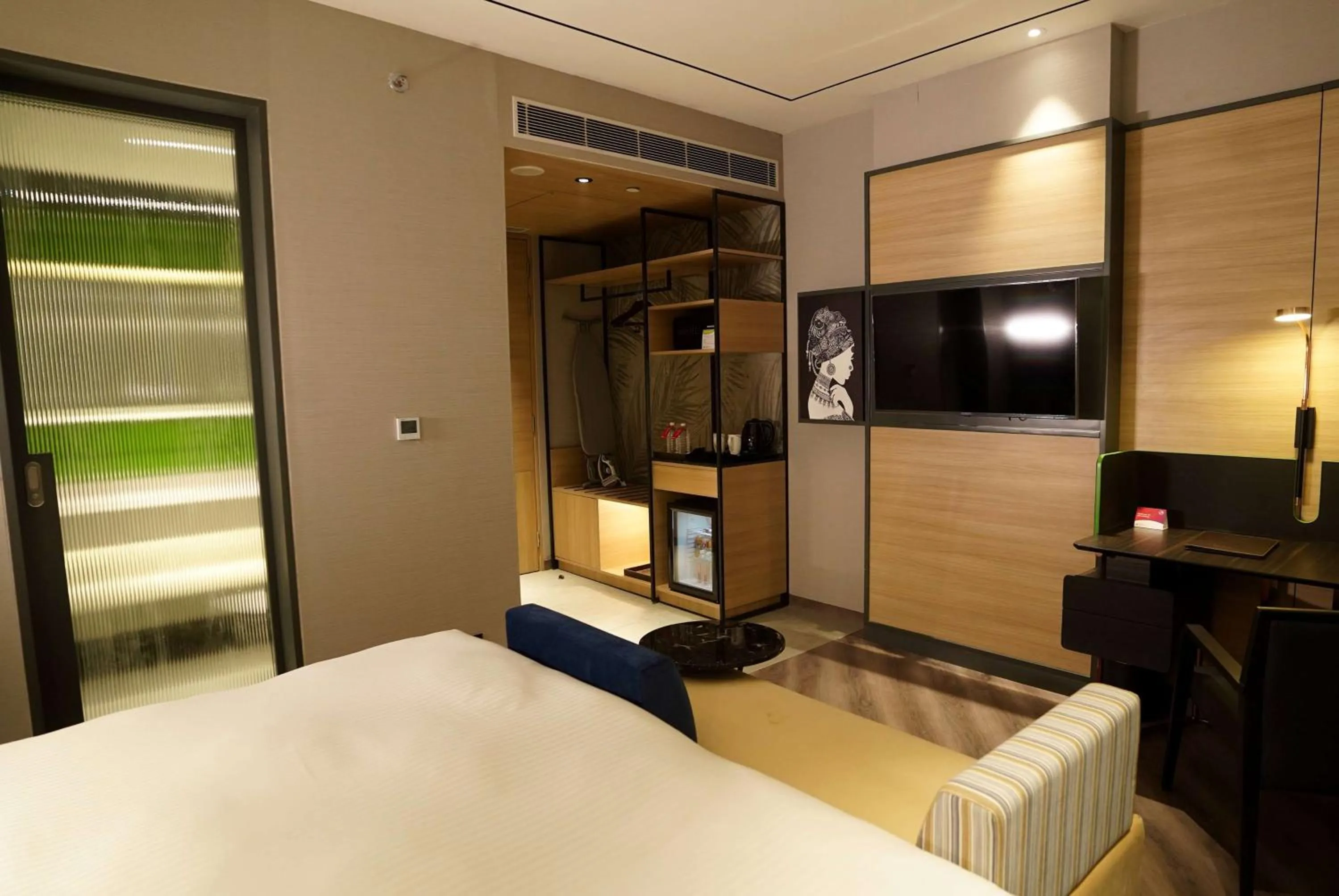 Photo of the whole room, Bed in Ramada Encore by Wyndham Bareilly Civil Lines