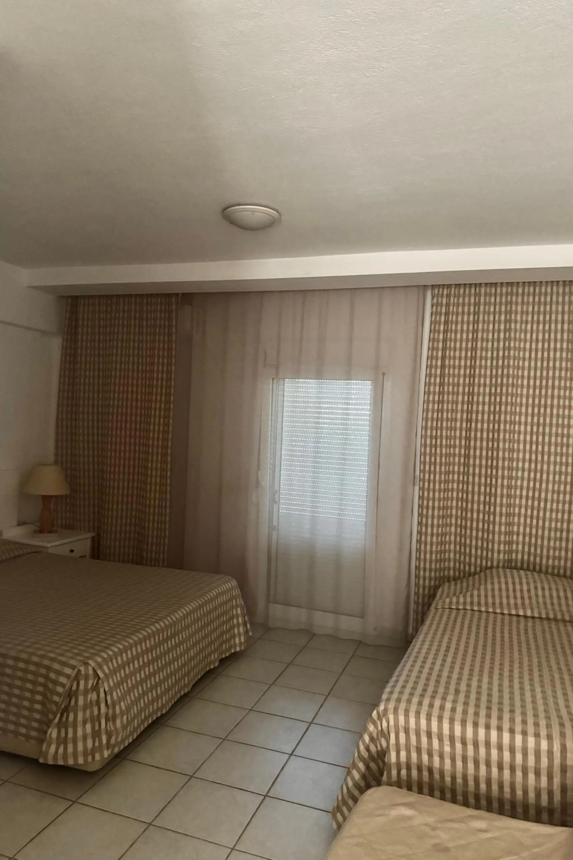 Bed in Milos Apartments