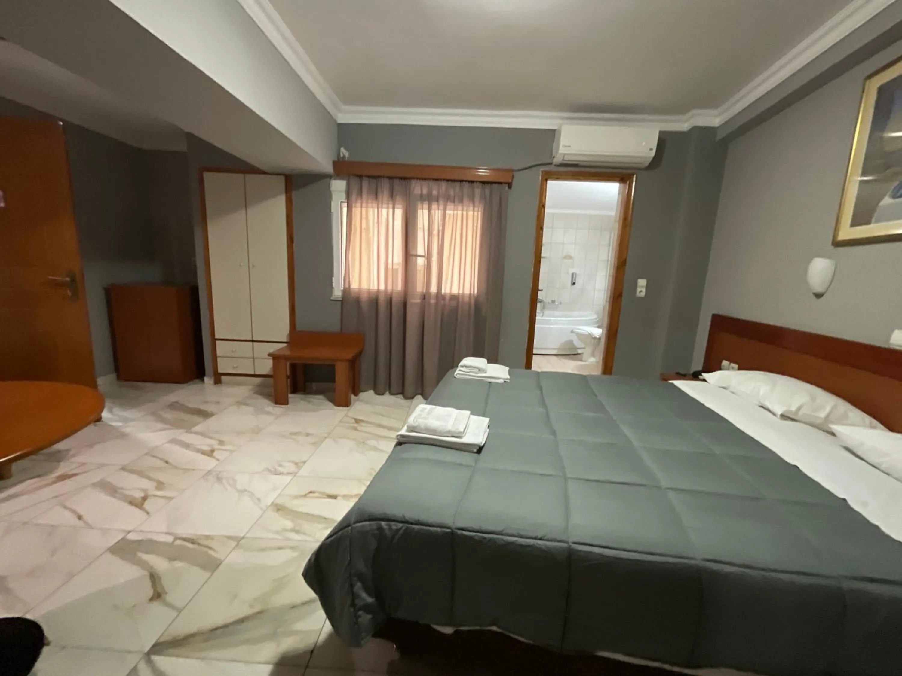 Photo of the whole room, Bed in Piraeus Acropole Hotel