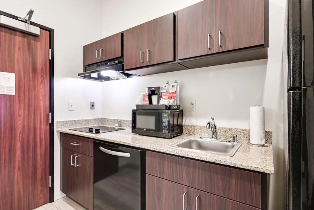 Kitchen or kitchenette in Cobblestone Hotel & Suites - Mosinee
