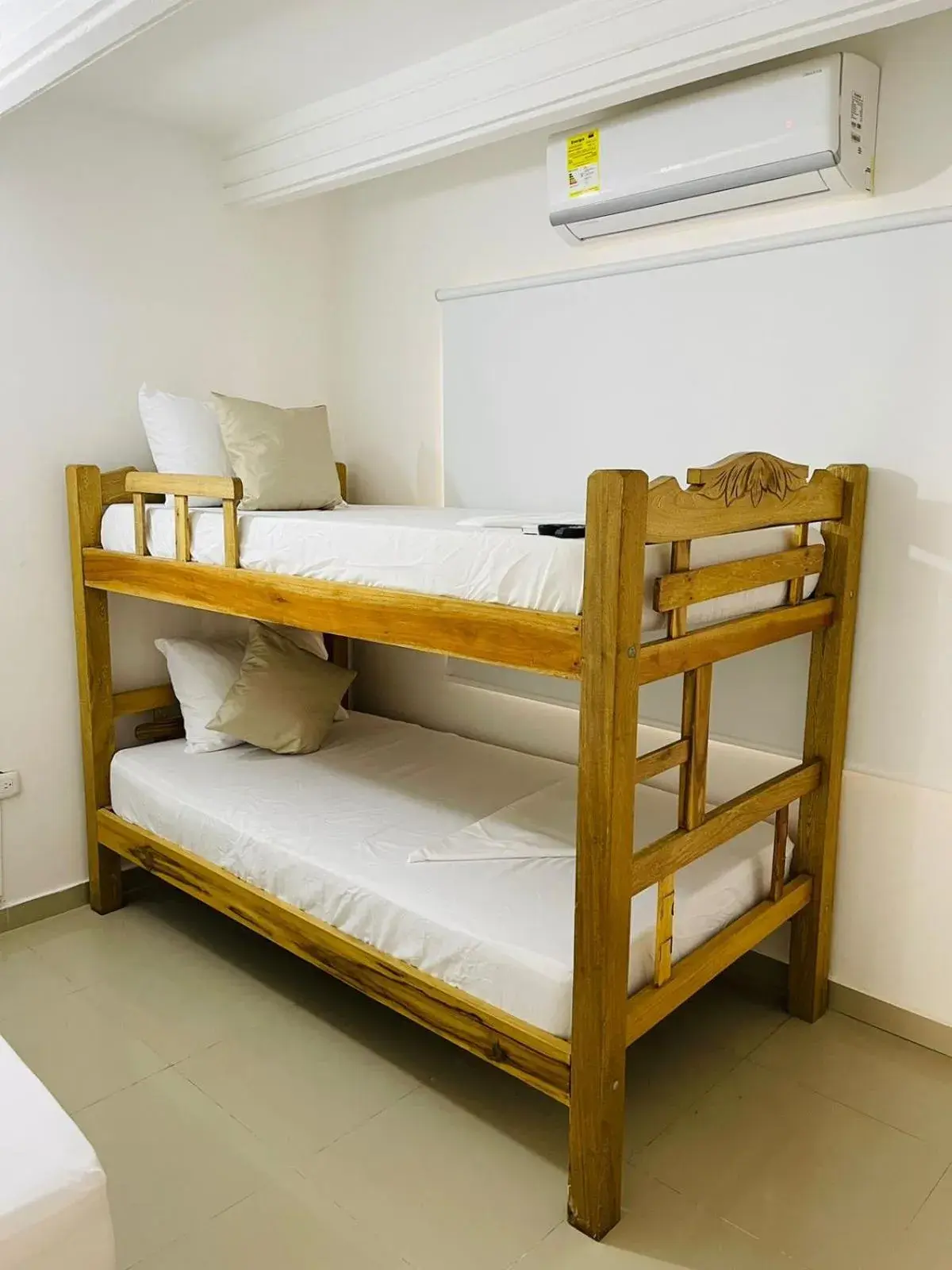 Quadruple Room with Private External Bathroom in Hotel Tamaca House Quadruple Room with Private External Bathroom in Hotel Tamaca House