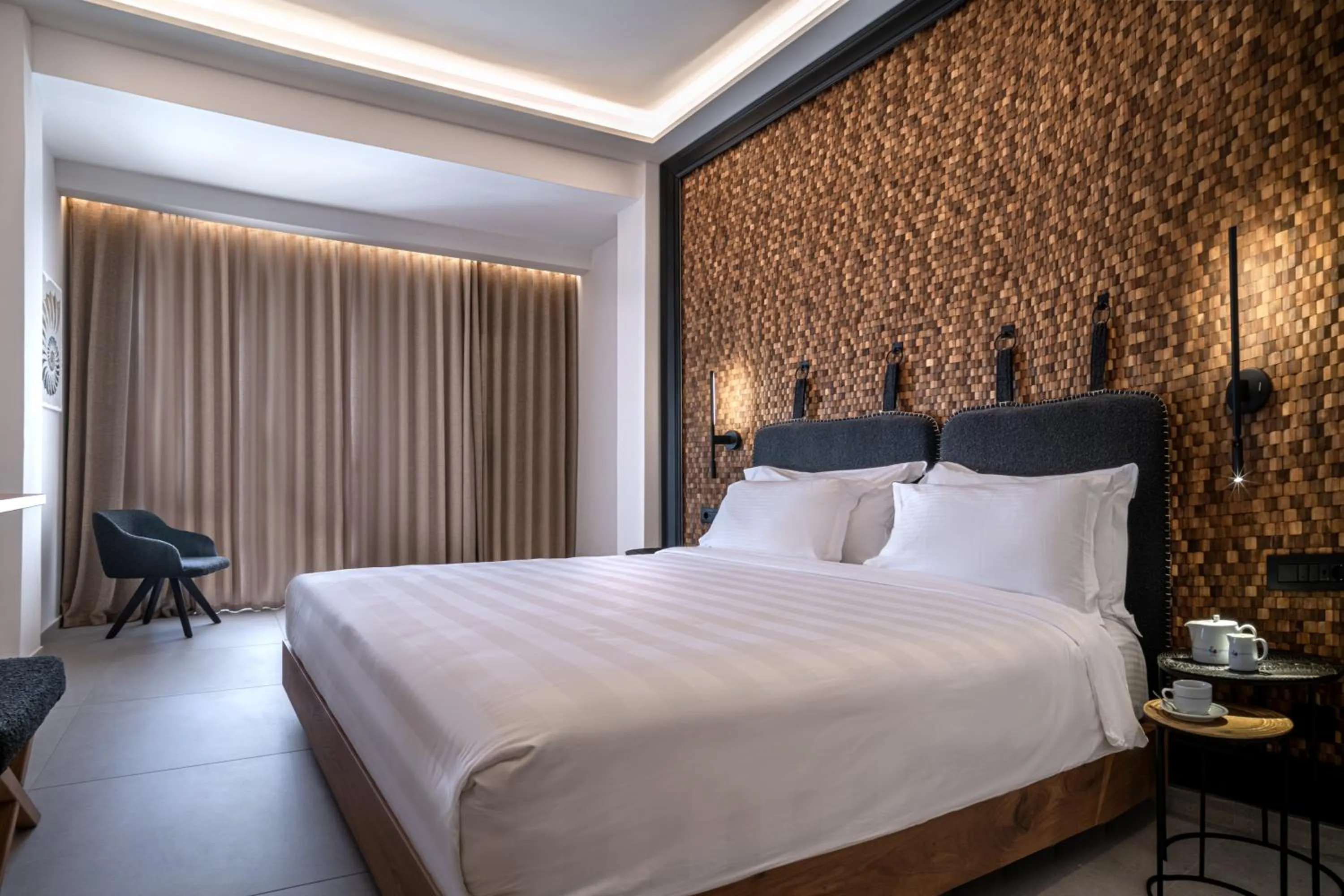 Bed in Petinos Hotel