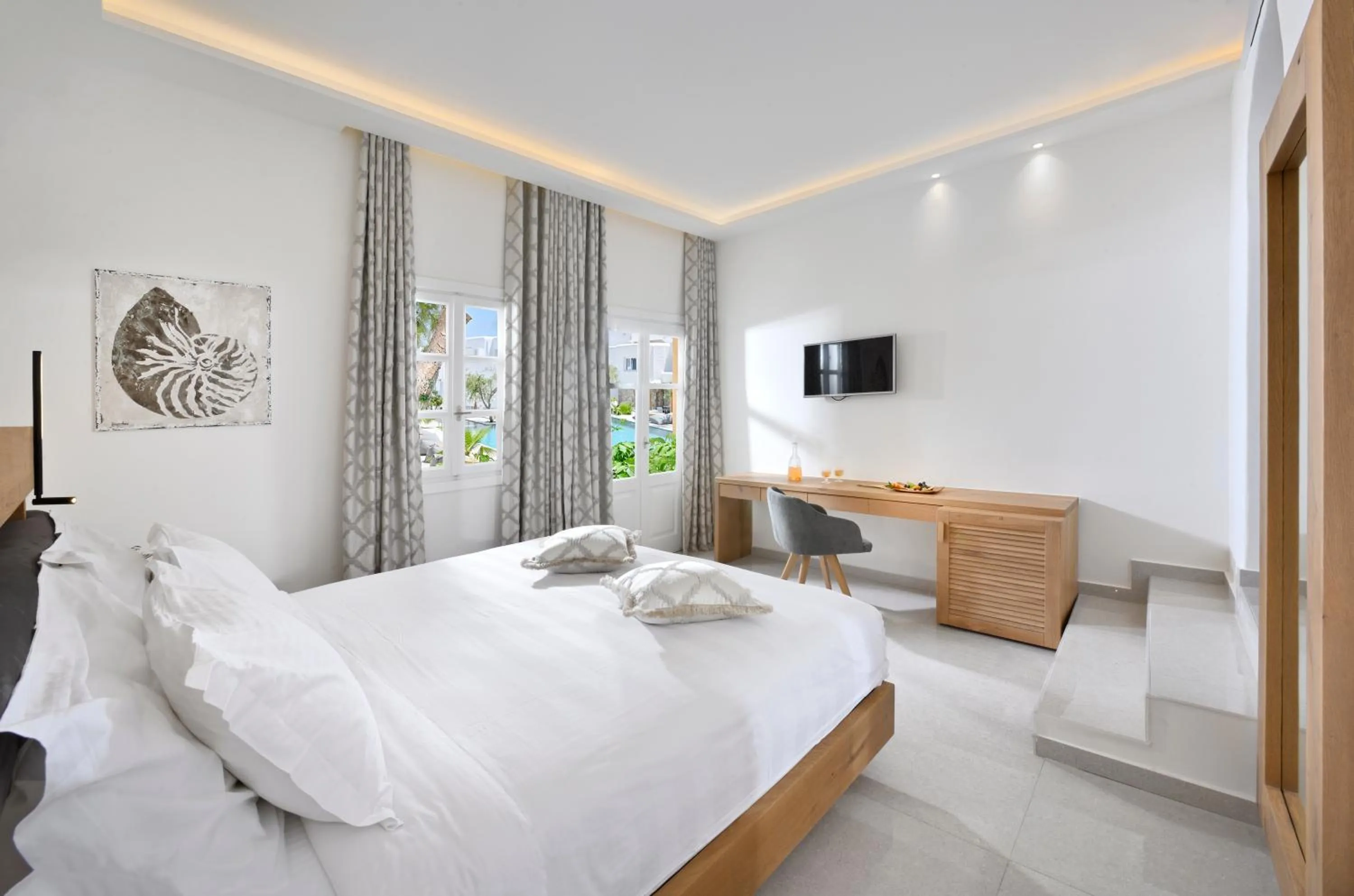 Bed in Petinos Hotel