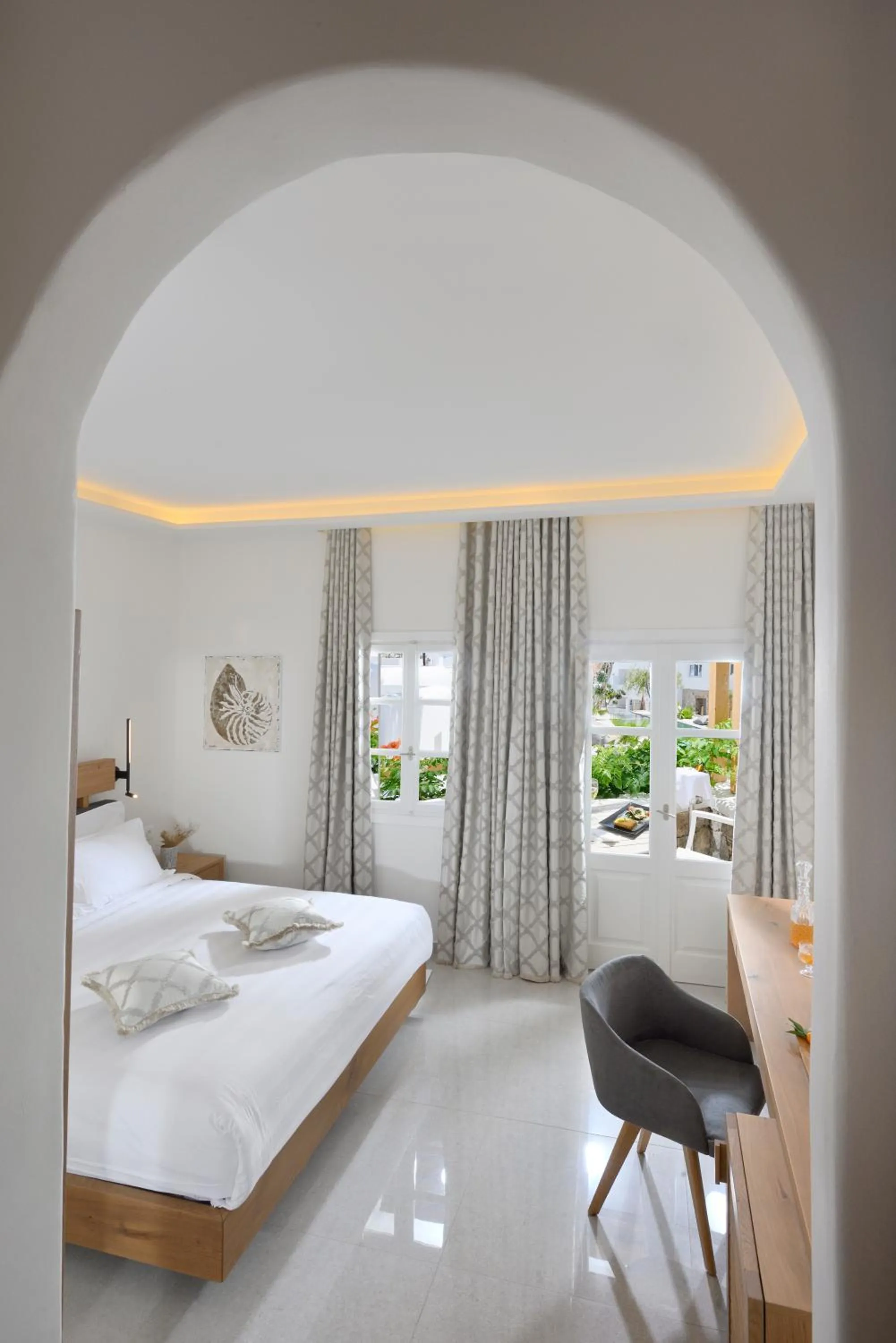 Bed in Petinos Hotel