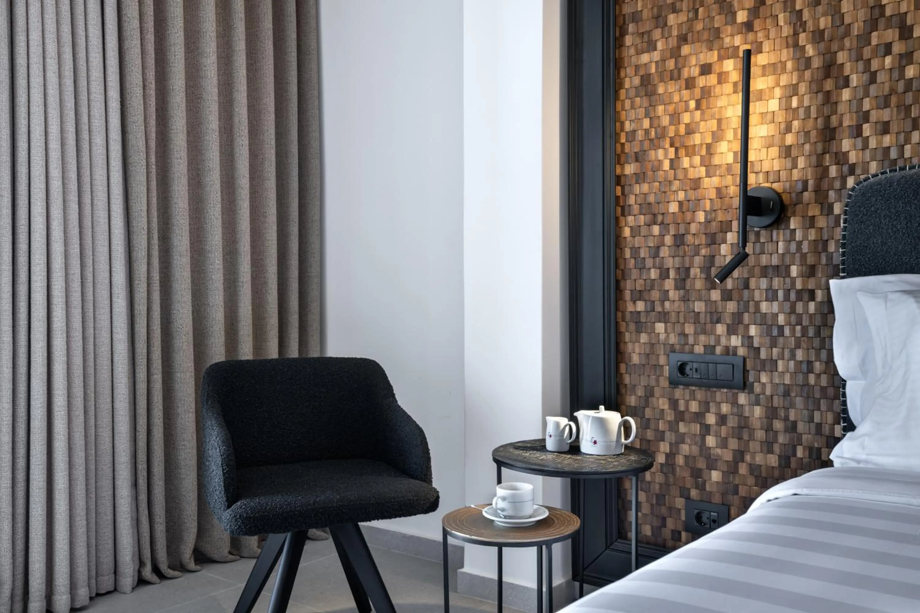 Bed in Petinos Hotel