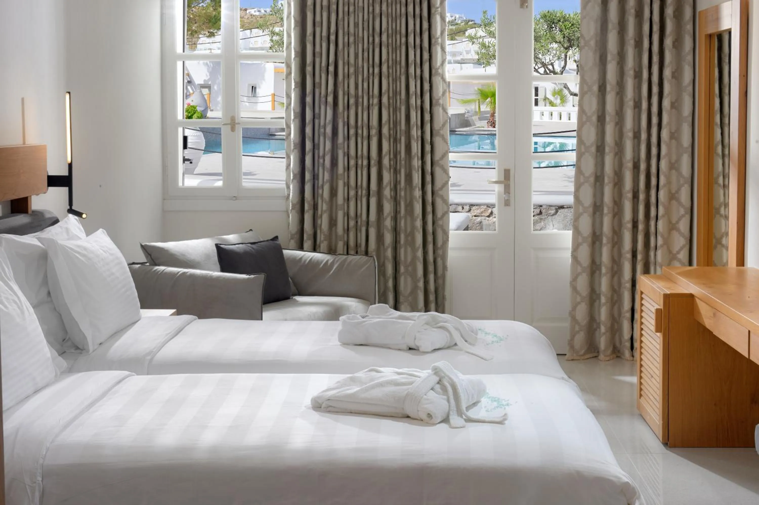 Bed in Petinos Hotel