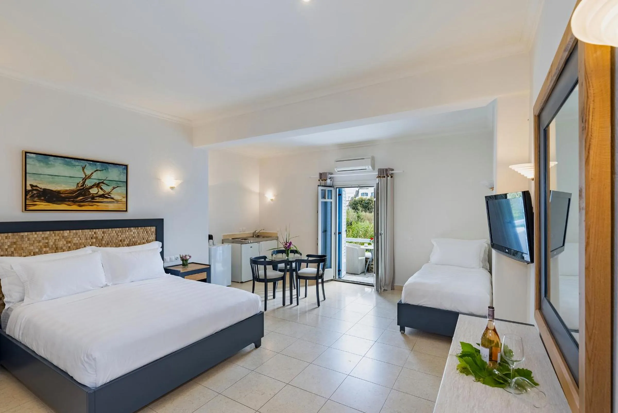 Bed in Petinos Hotel