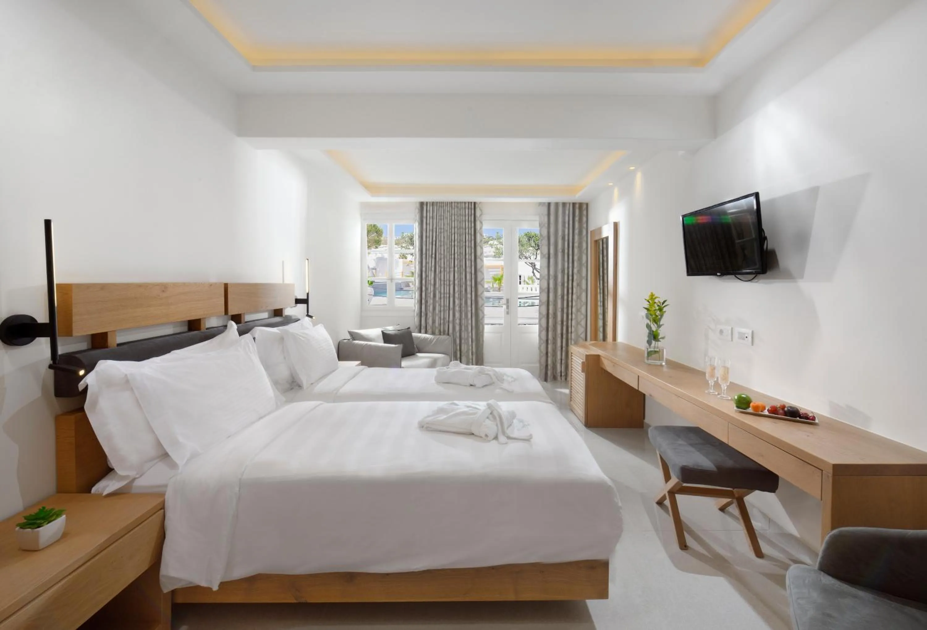 Bed in Petinos Hotel