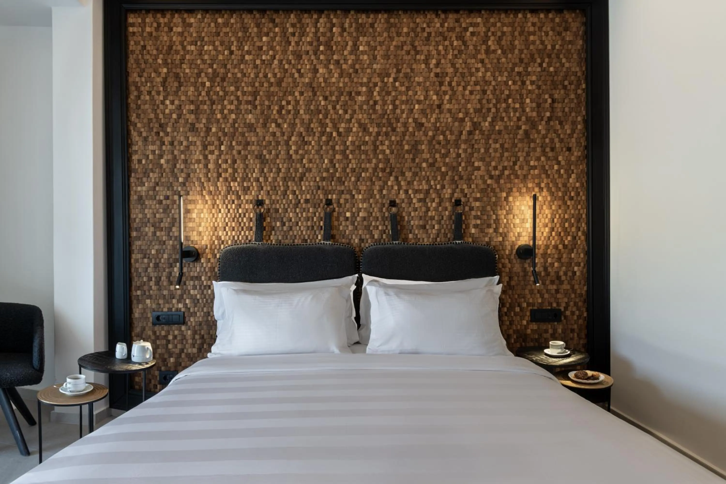 Bed in Petinos Hotel