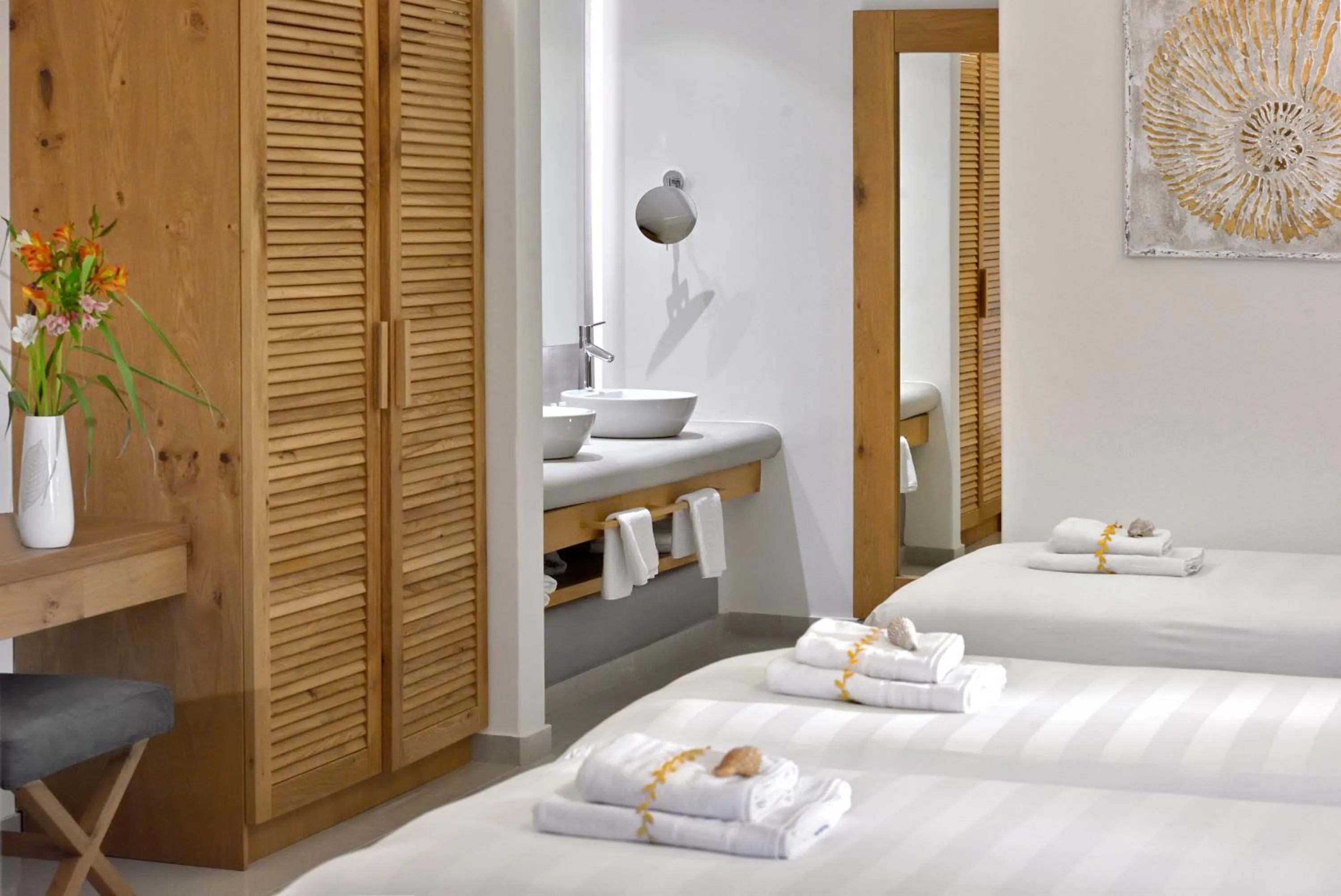 Bed in Petinos Hotel