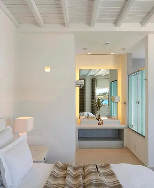 Bathroom, Bed in Petinos Beach Hotel