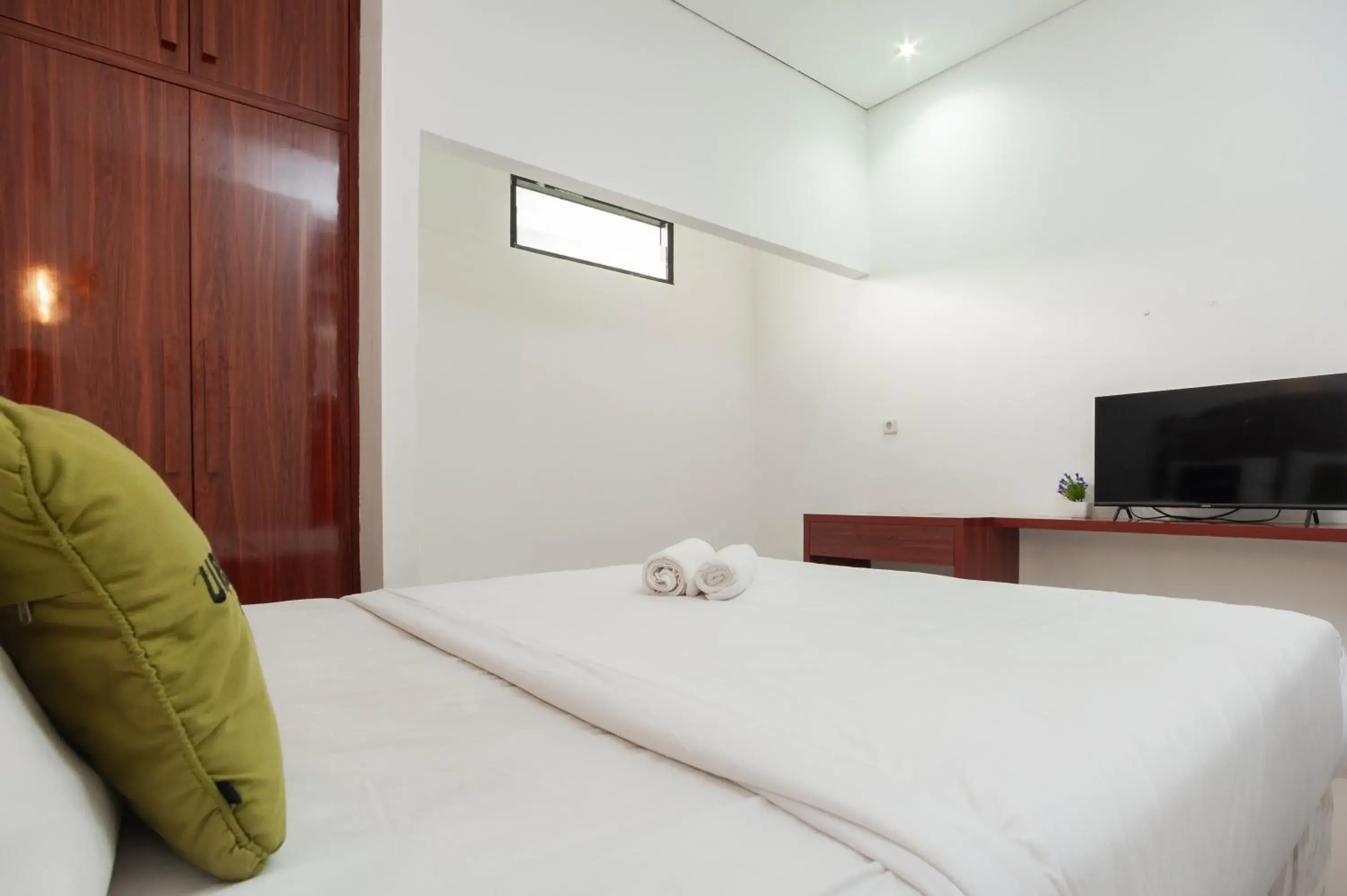 Bed in Urbanview Hotel Amarilis Sentul Bogor by RedDoorz Bed in Urbanview Hotel Amarilis Sentul Bogor by RedDoorz