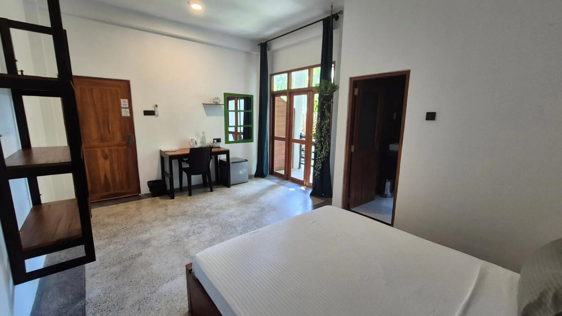 Photo of the whole room, Bed in Mothership