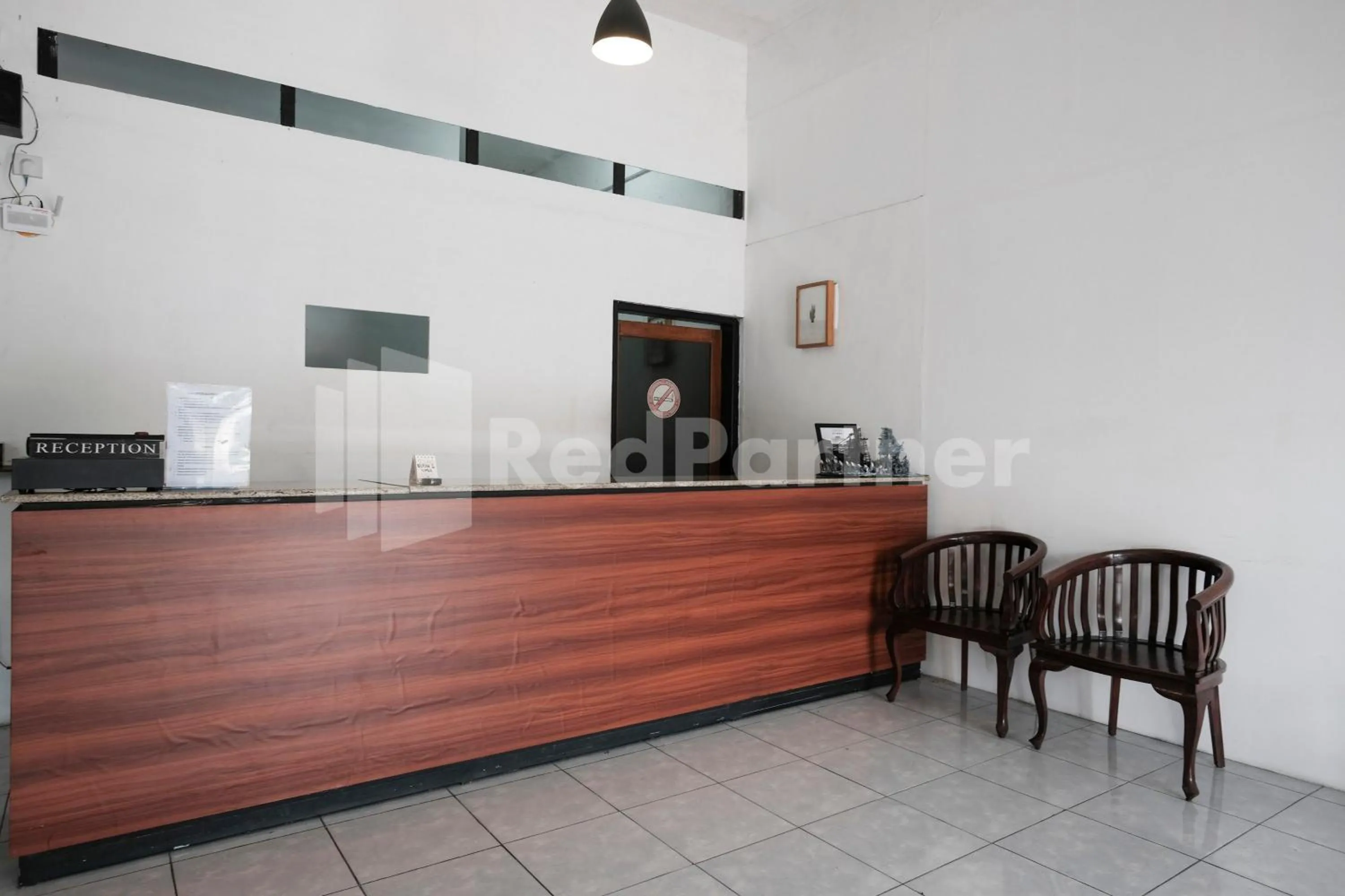 Lobby or reception in Katup Guest House Syariah Mitra RedDoorz