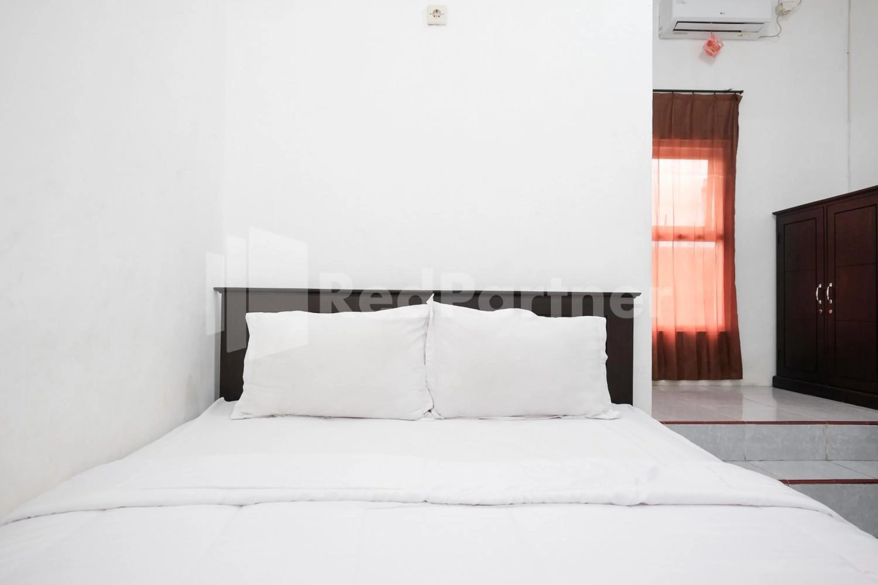 Bedroom, Bed in Katup Guest House Syariah Mitra RedDoorz