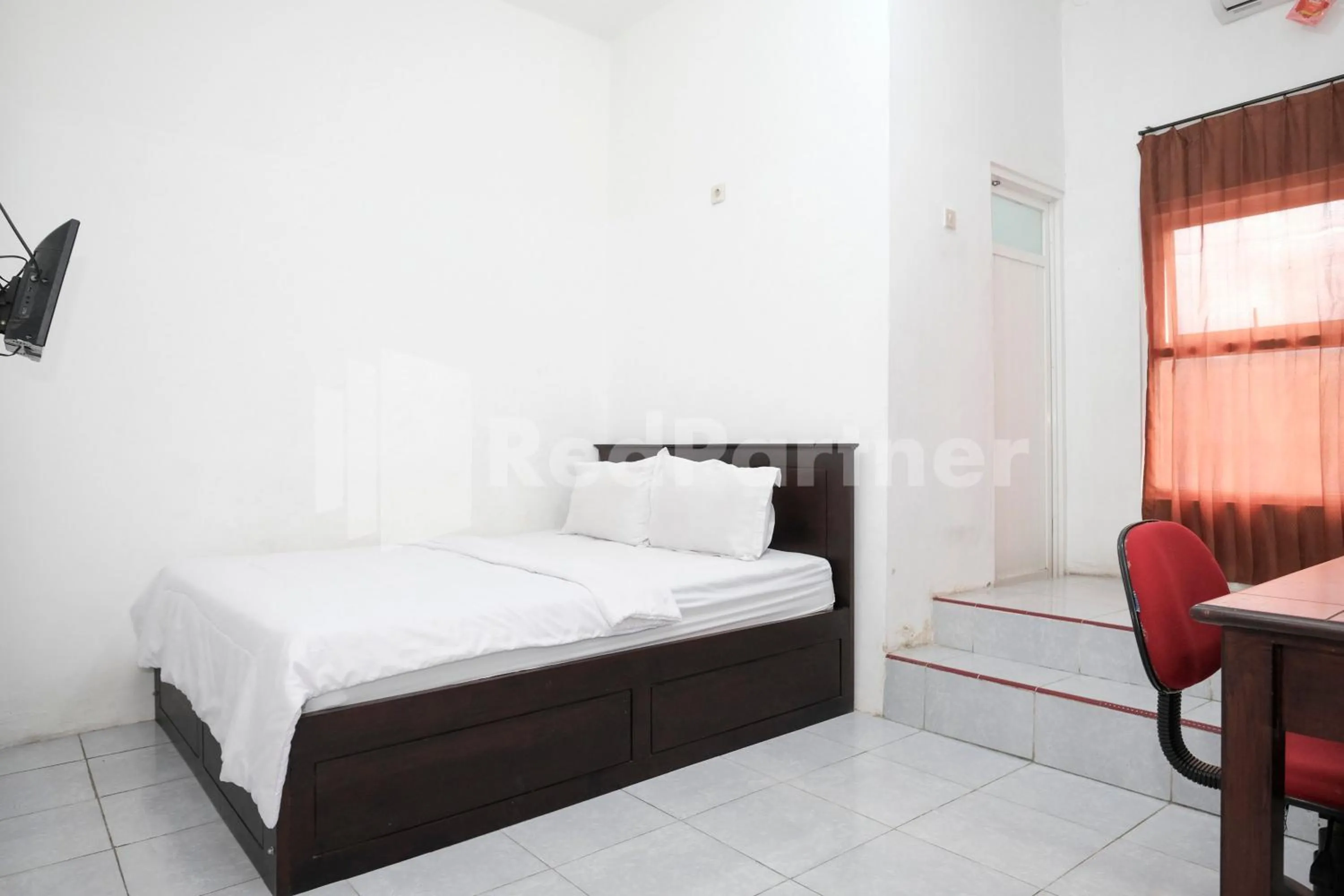 Bedroom, Bed in Katup Guest House Syariah Mitra RedDoorz