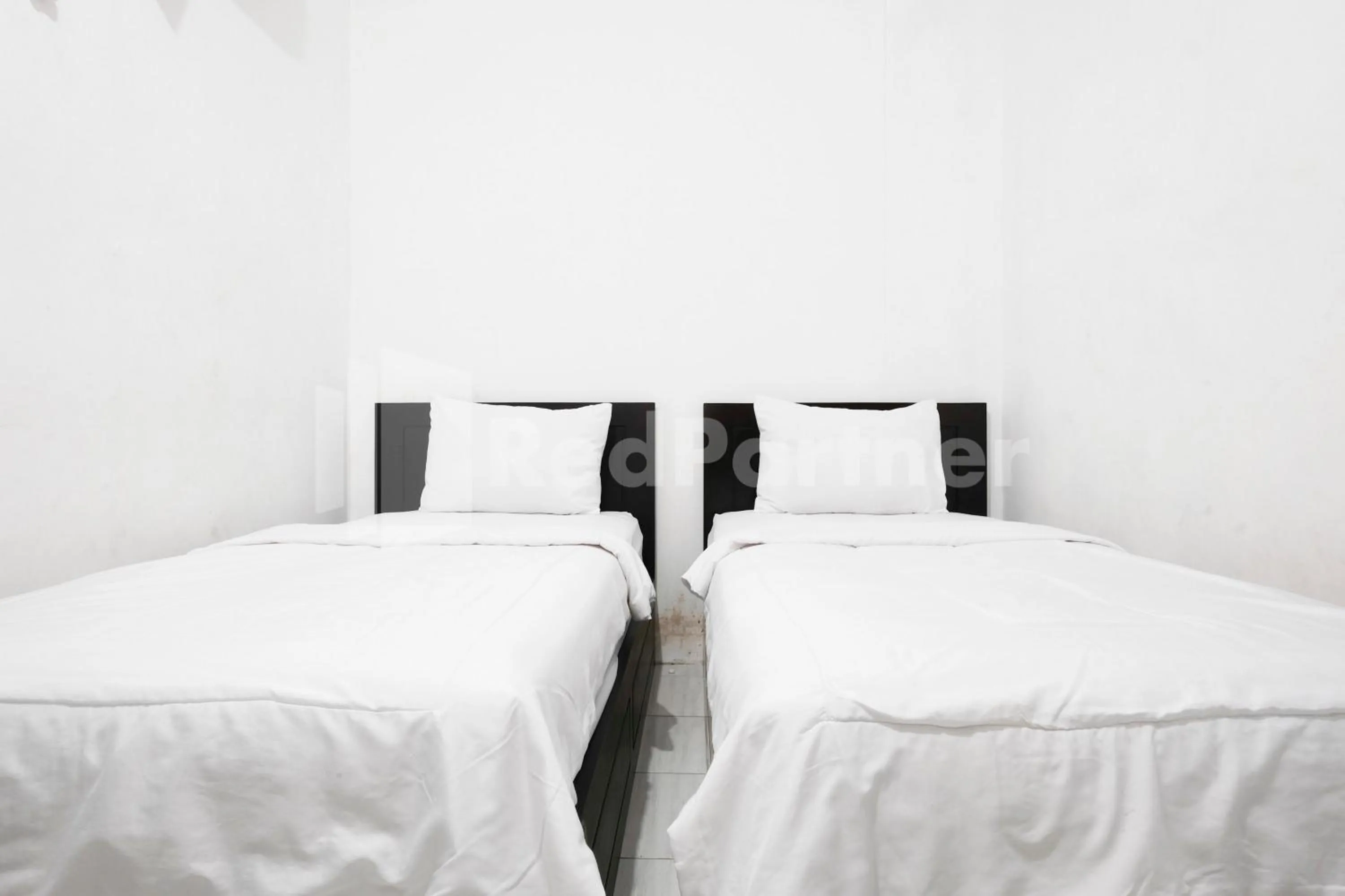Bedroom, Bed in Katup Guest House Syariah Mitra RedDoorz