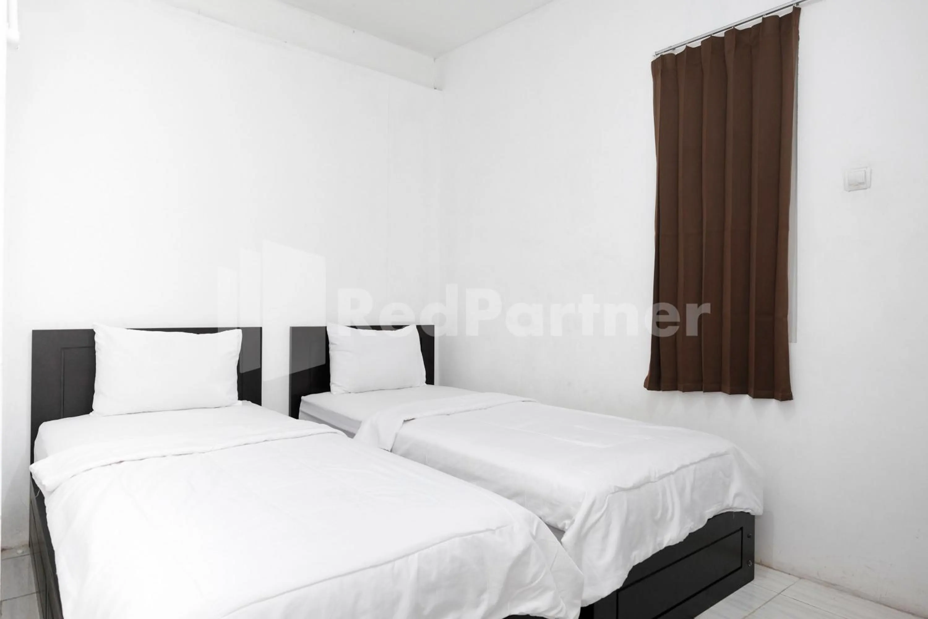 Bedroom, Bed in Katup Guest House Syariah Mitra RedDoorz