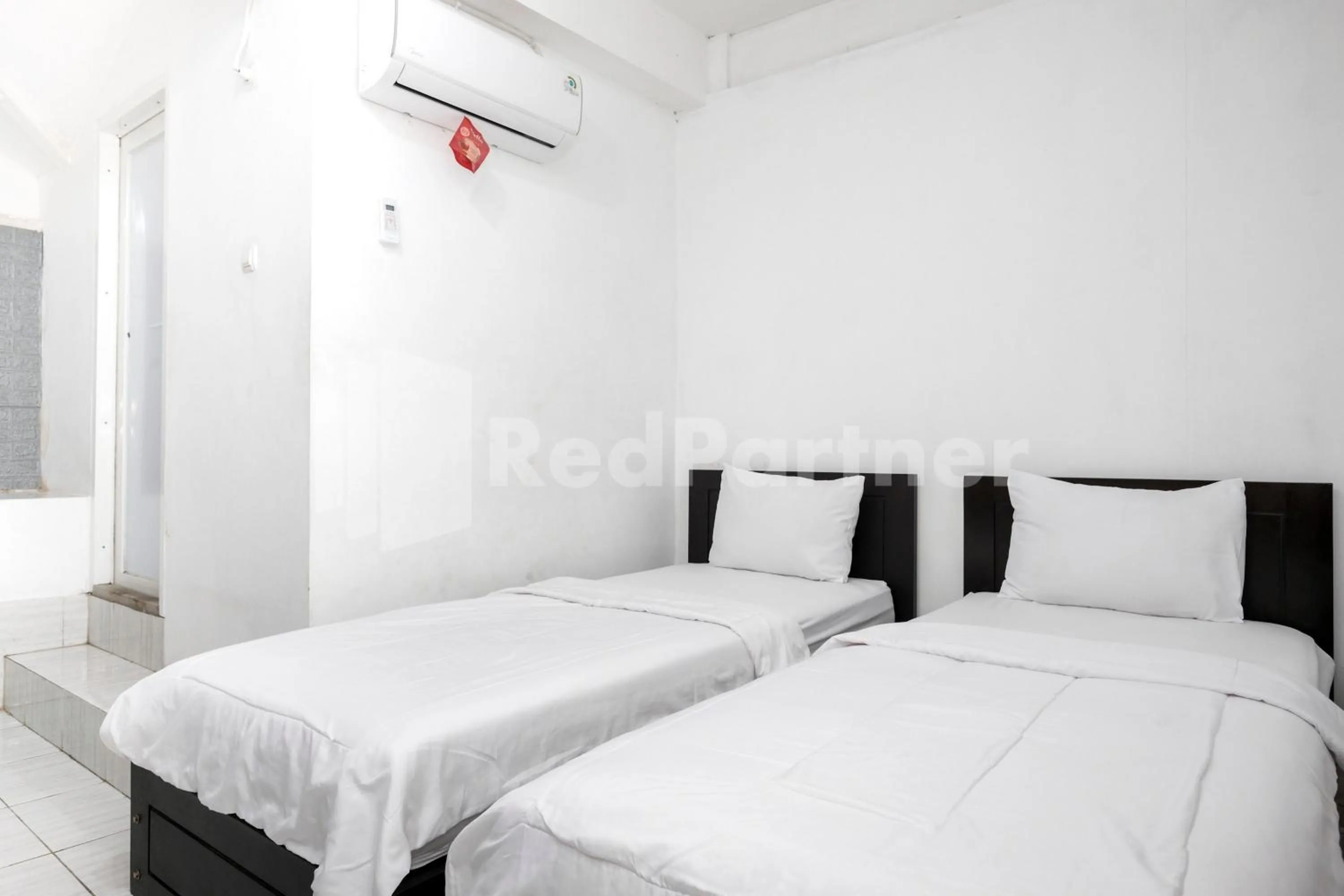 Bedroom, Bed in Katup Guest House Syariah Mitra RedDoorz