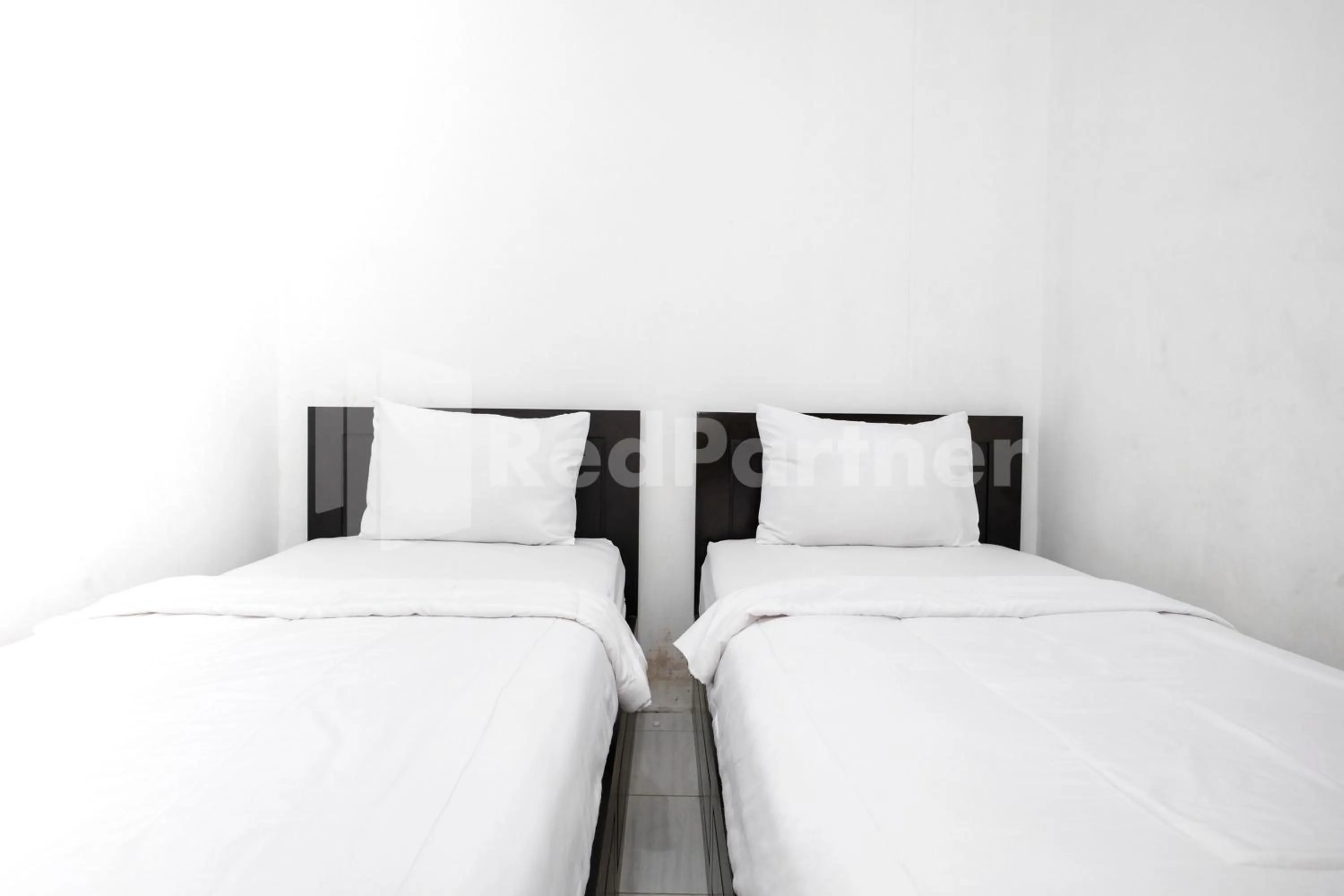 Bedroom, Bed in Katup Guest House Syariah Mitra RedDoorz