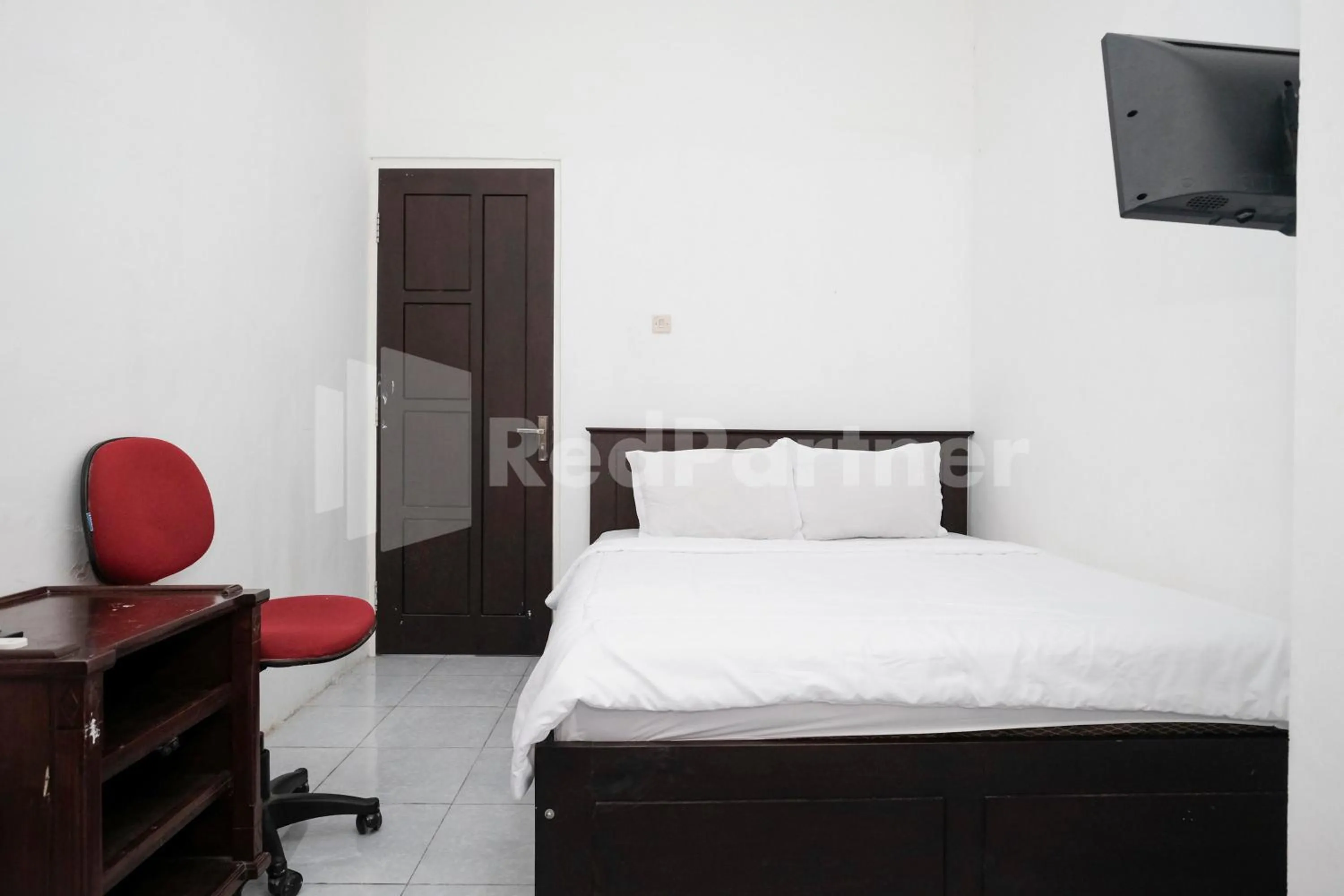 Bedroom, Bed in Katup Guest House Syariah Mitra RedDoorz