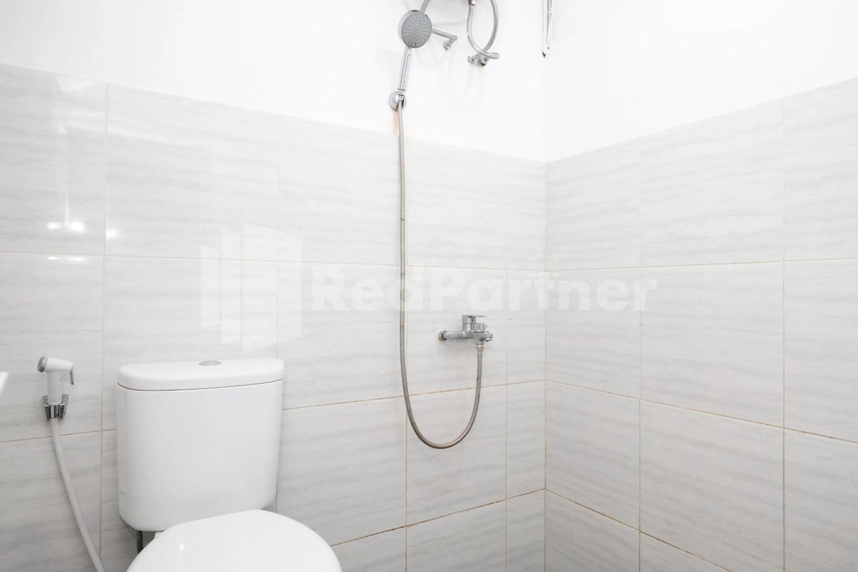 Bathroom in Katup Guest House Syariah Mitra RedDoorz