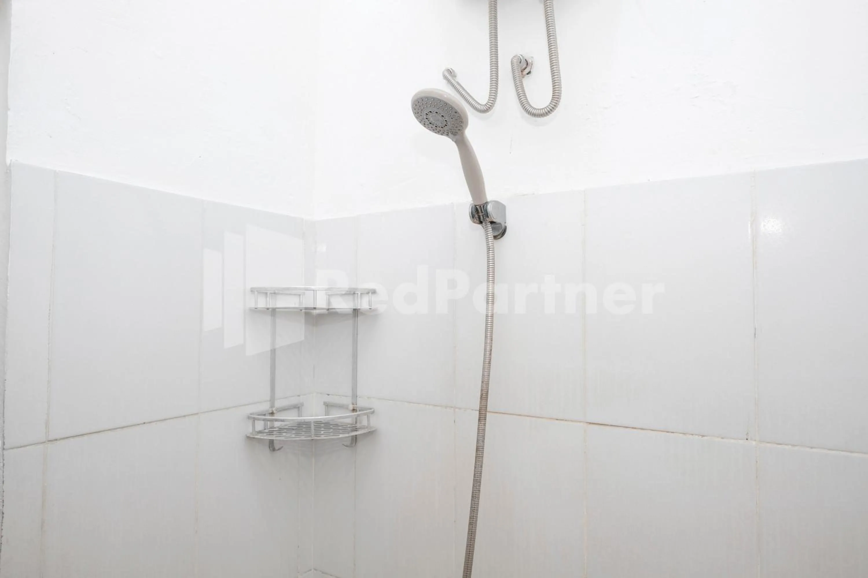 Bathroom in Katup Guest House Syariah Mitra RedDoorz