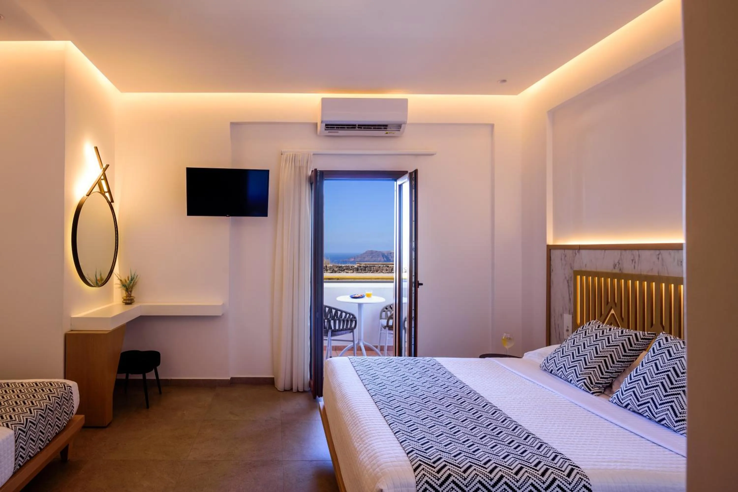 Bed in Astir Thira Hotel