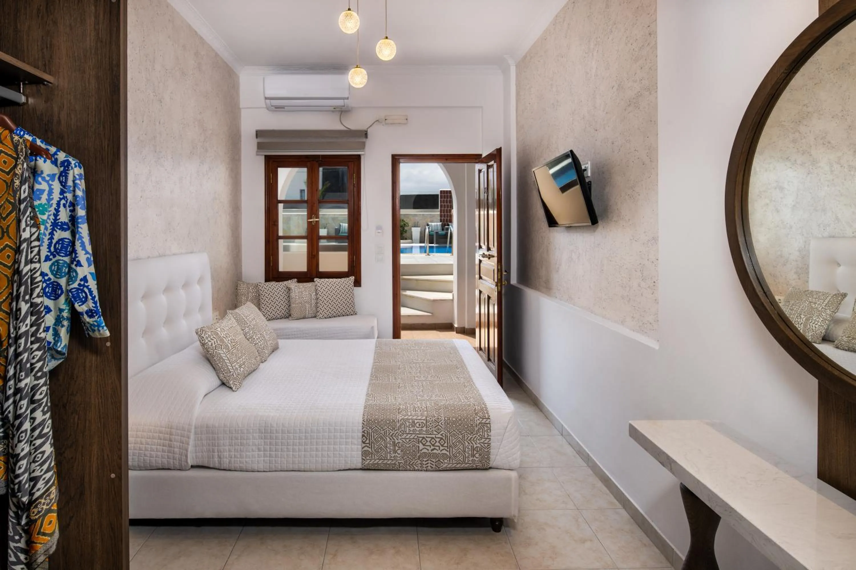 Bed in Astir Thira Hotel