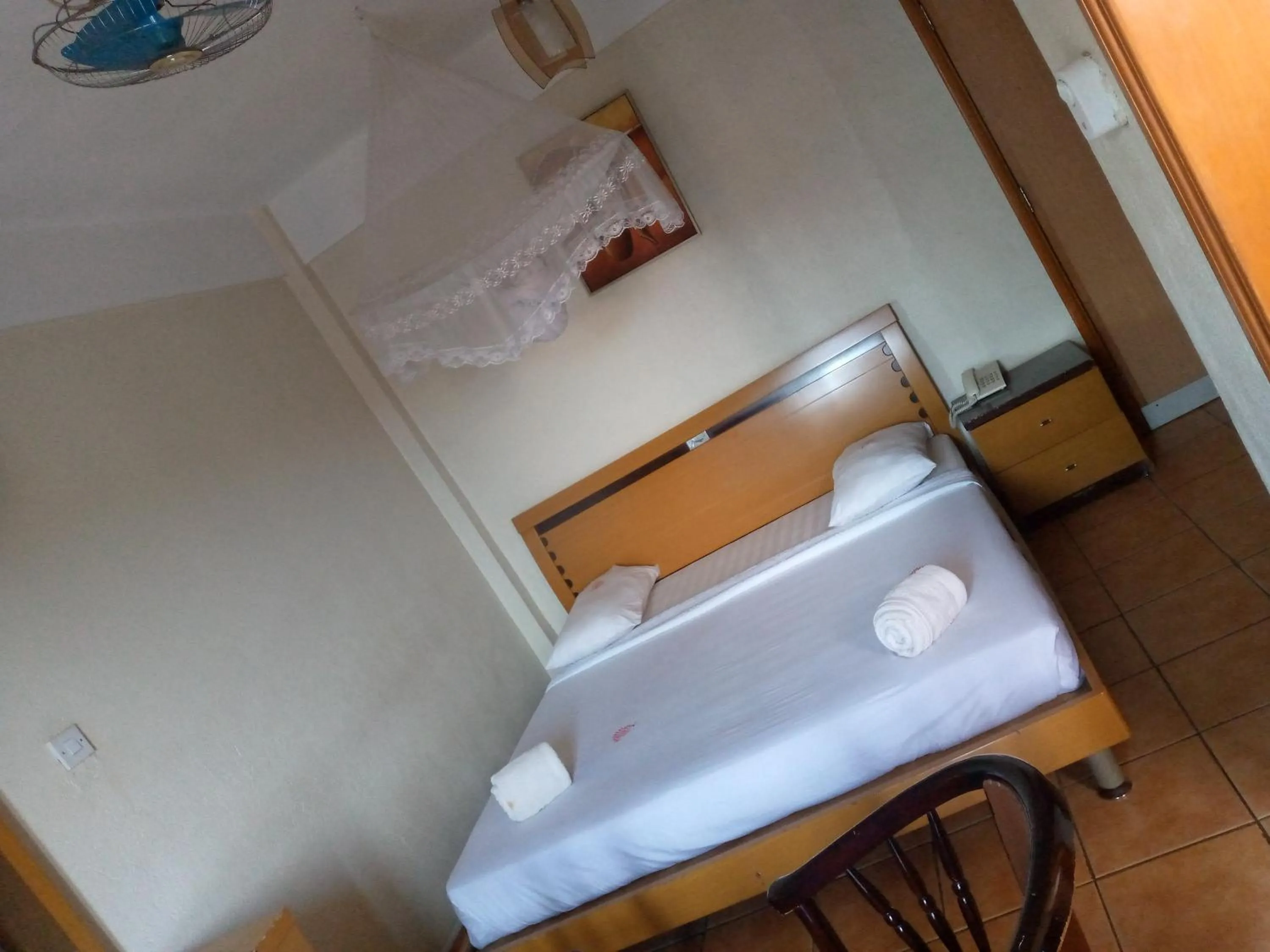 Bed in DOUBLE FIVE HOTEL