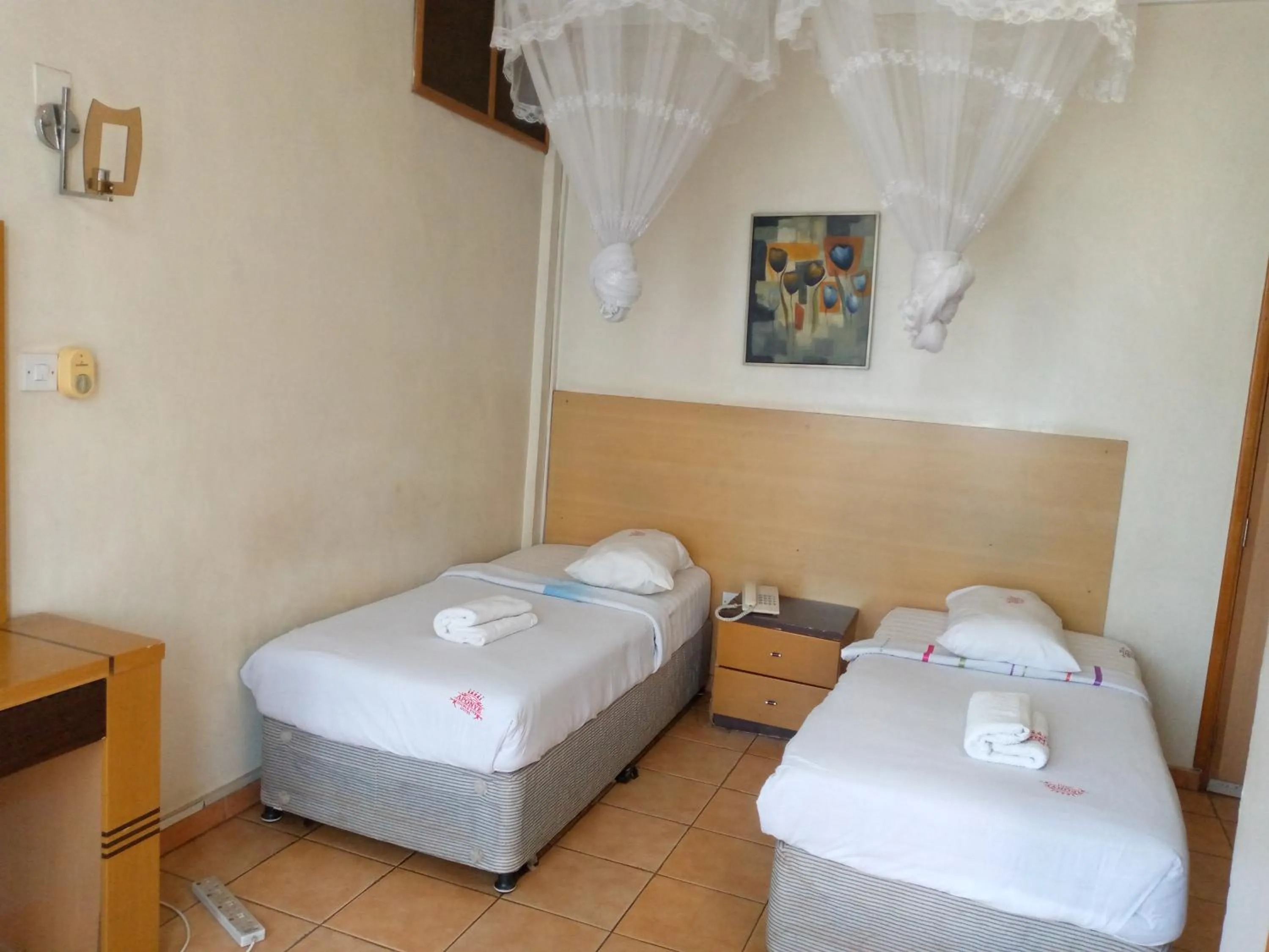 Bed in DOUBLE FIVE HOTEL