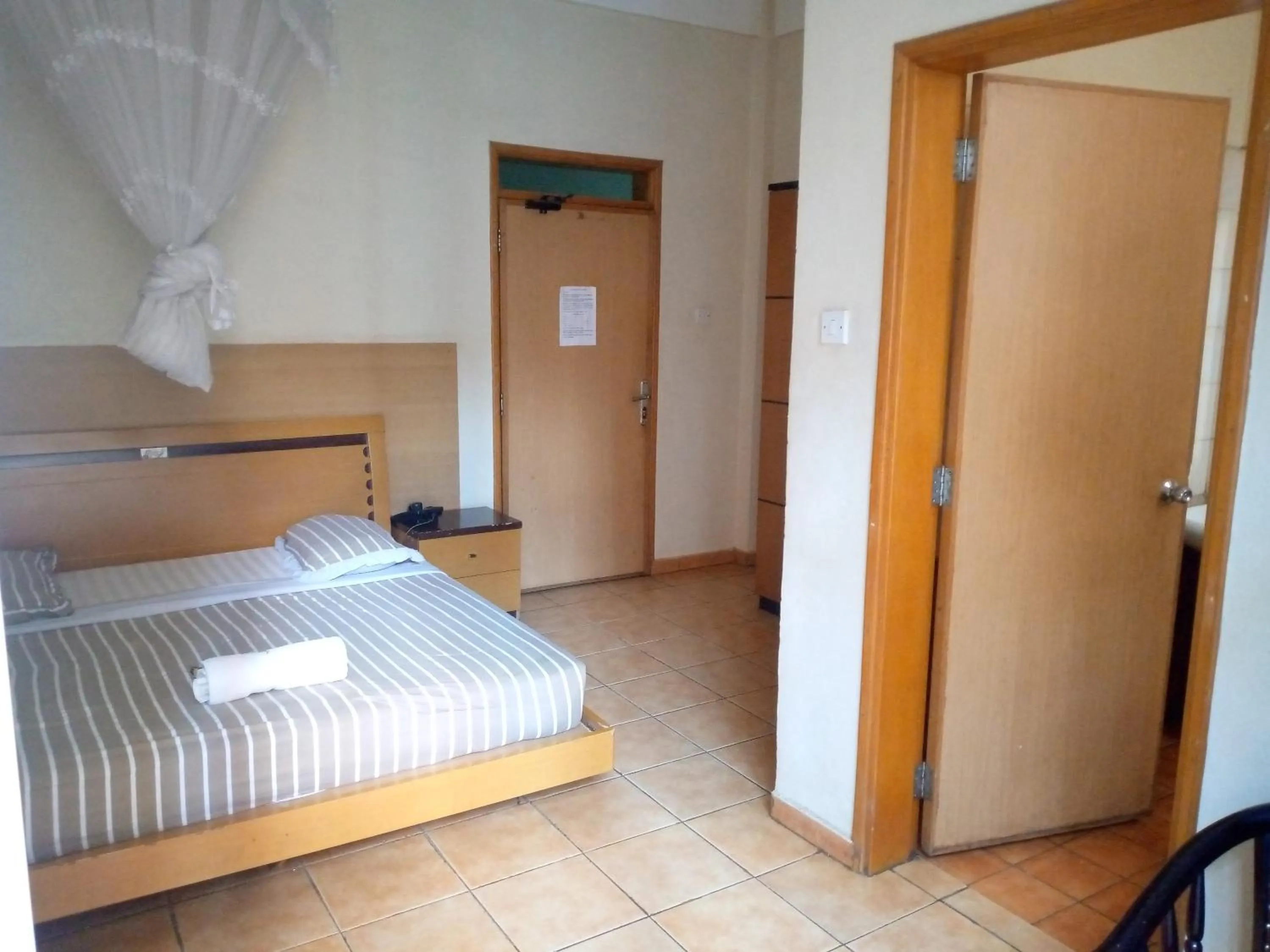 Bed in DOUBLE FIVE HOTEL