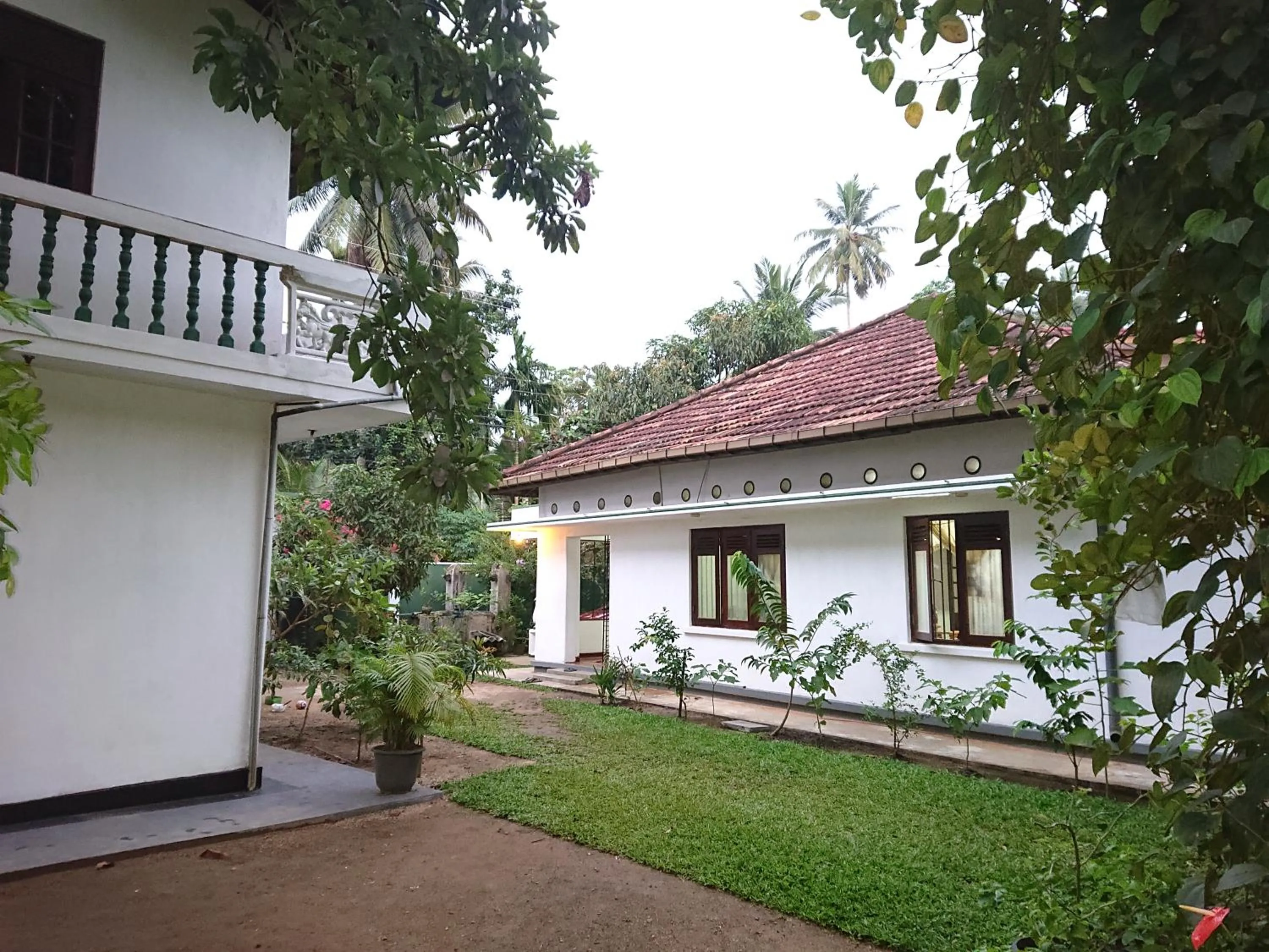 More Attractive wonderful 1950 mid-century home with another newly built house