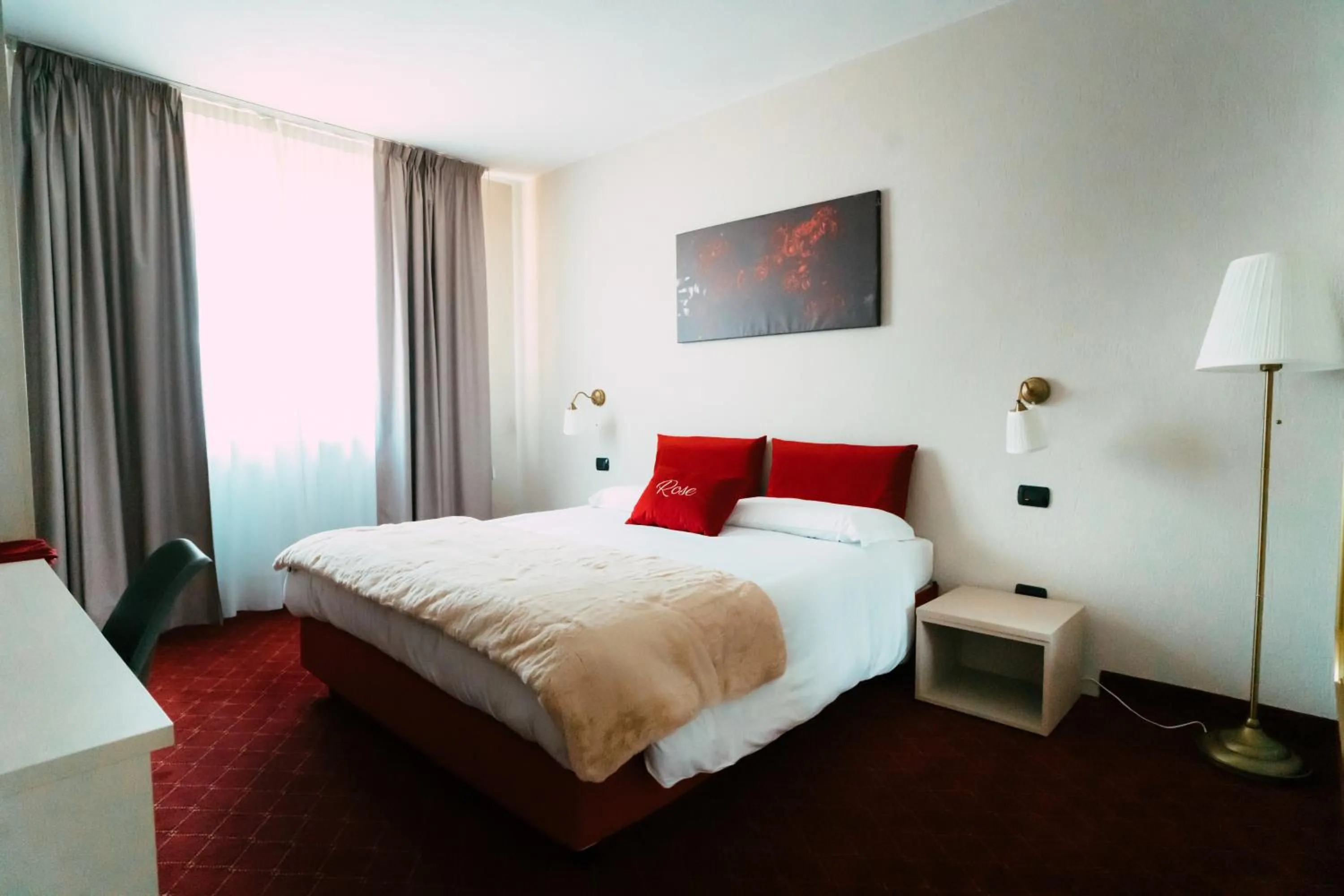 Bed in Essenza Hotel