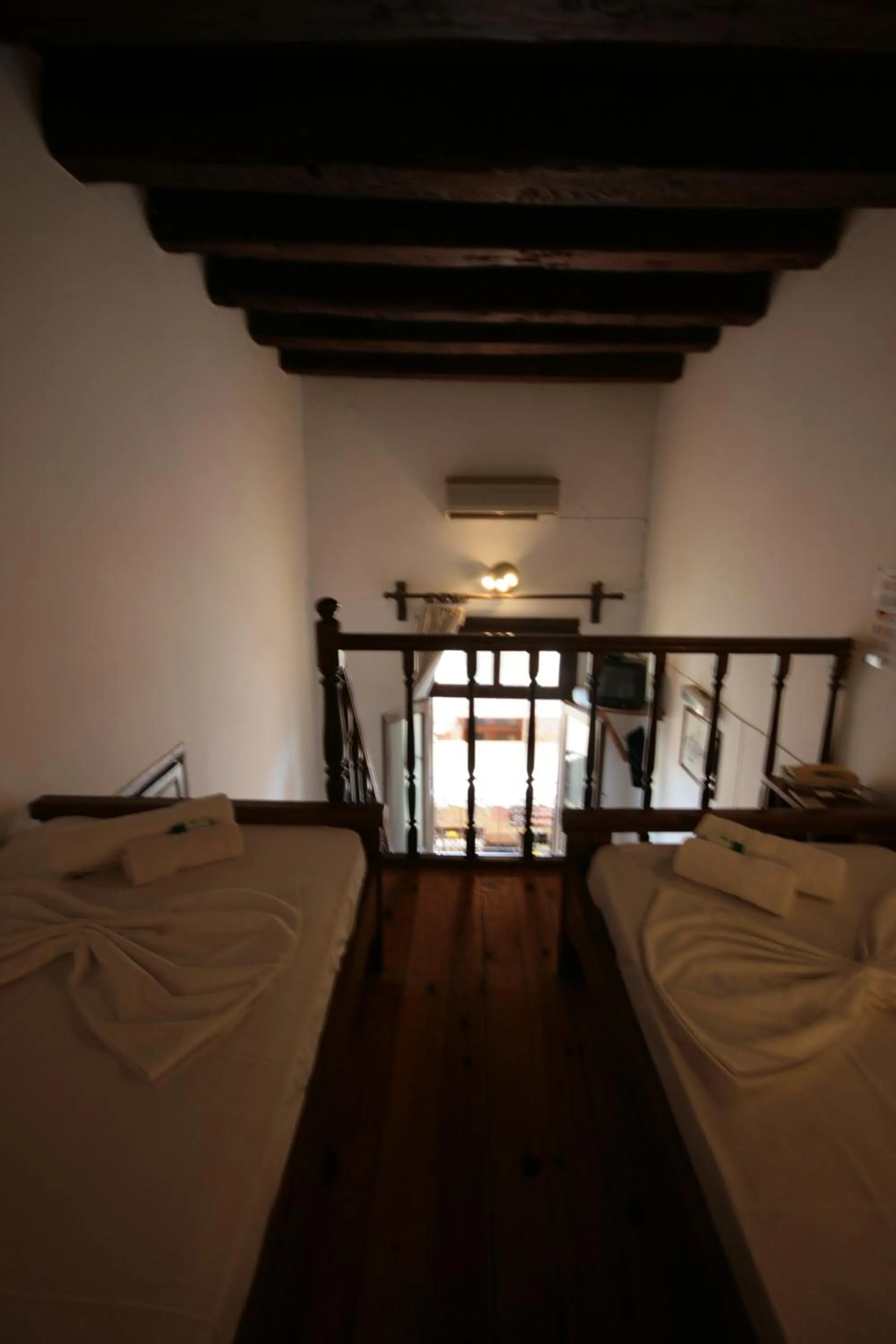 Bed in Chania Rooms