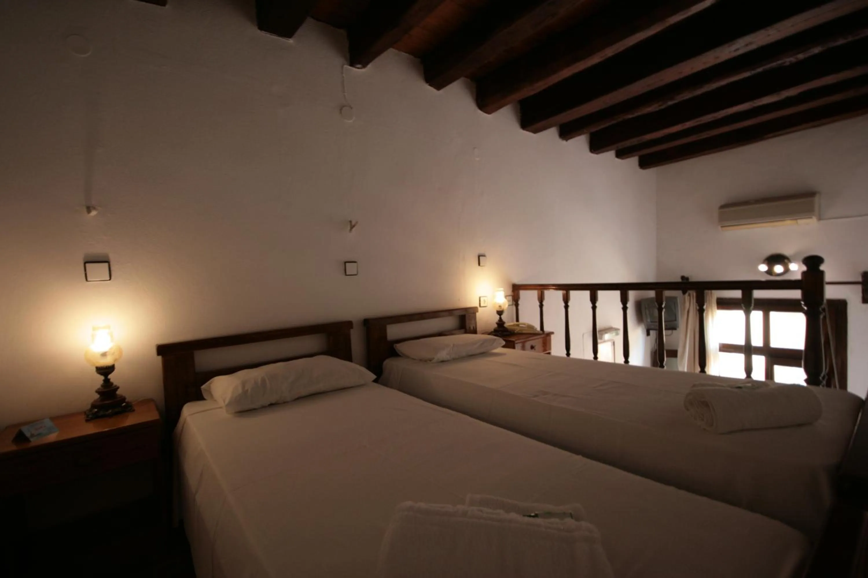 Bed in Chania Rooms