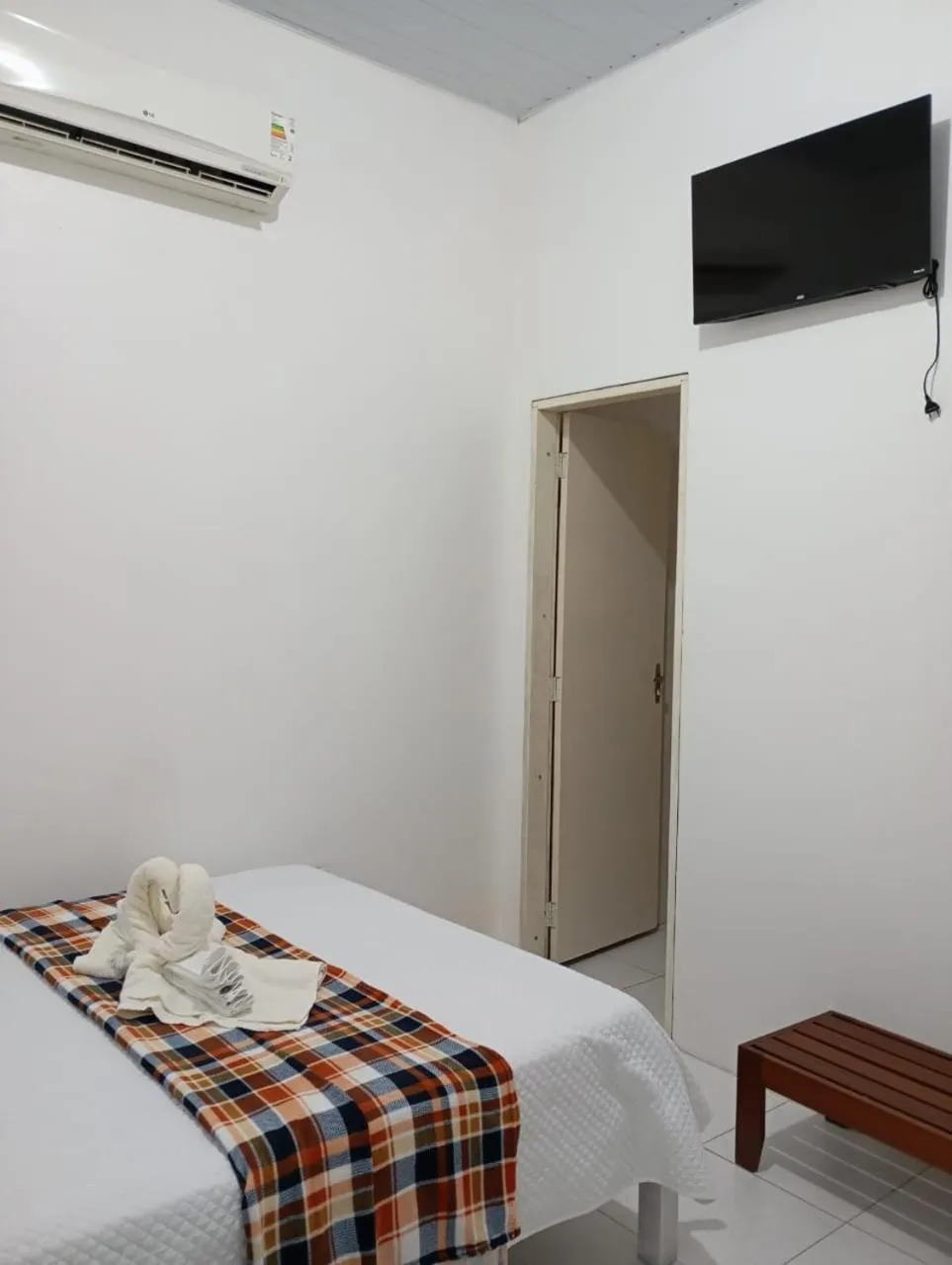 Bed in POUSADA ESTRELA DA MANHÃ