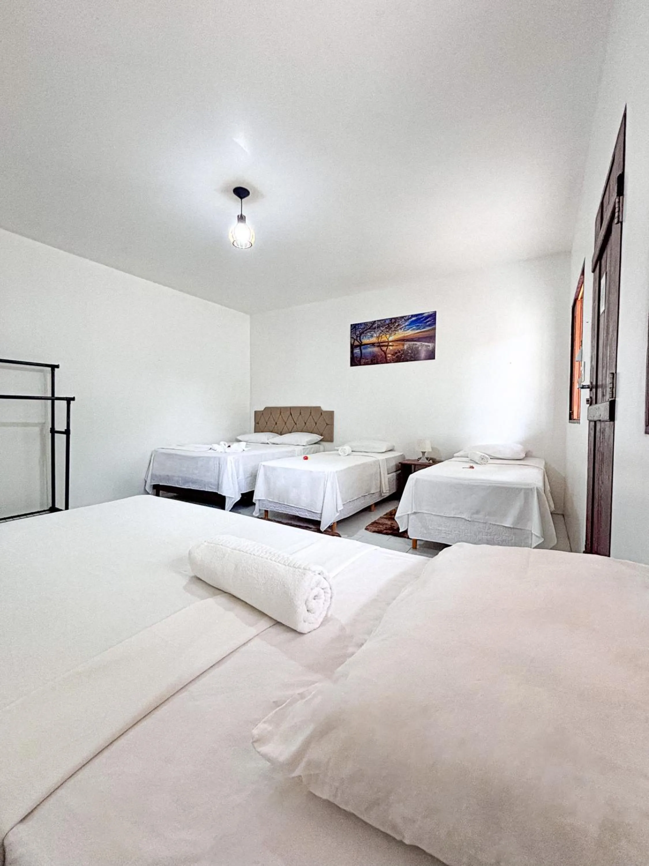 Bed in POUSADA ESTRELA DA MANHÃ