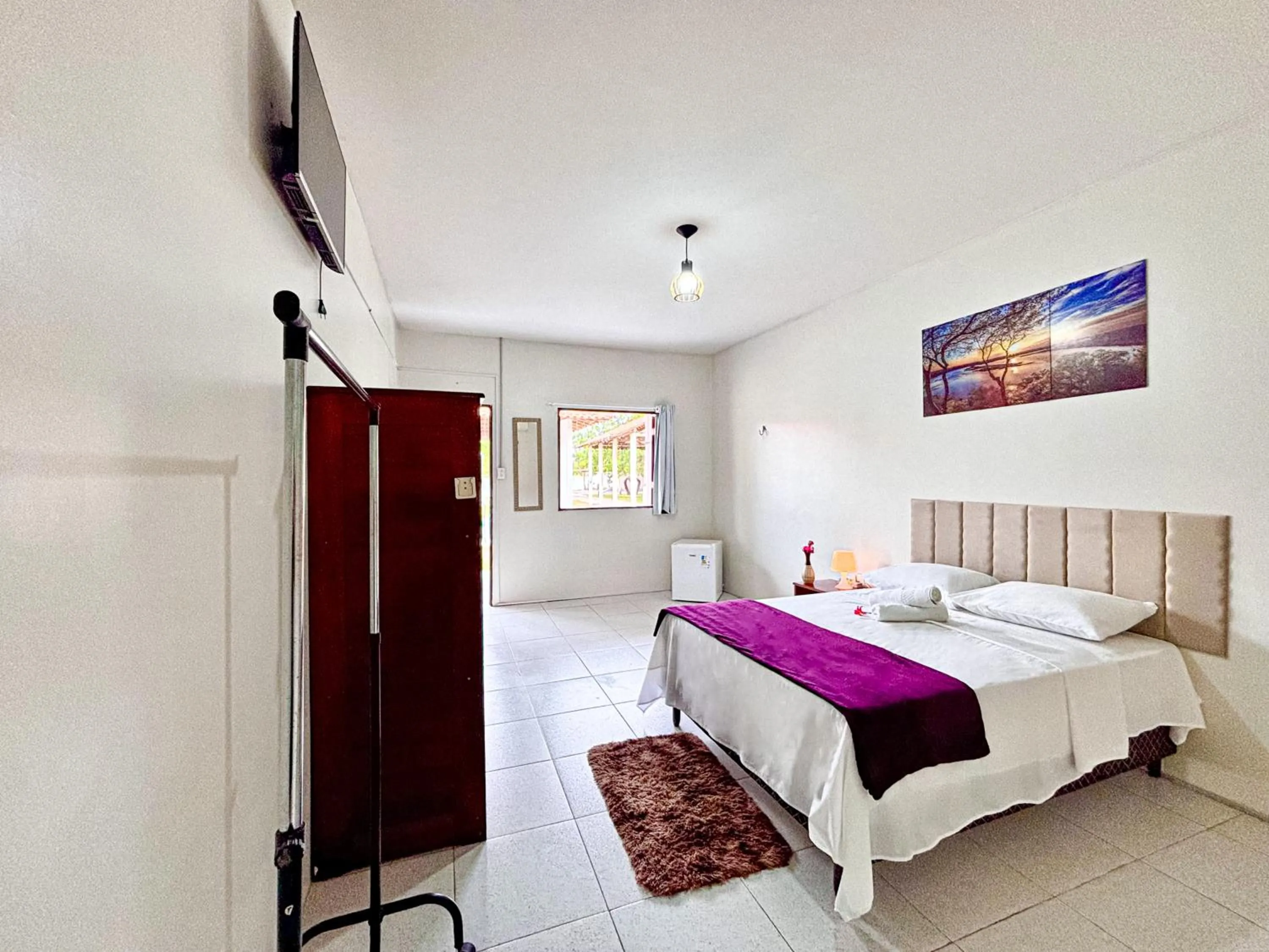 Bed in POUSADA ESTRELA DA MANHÃ