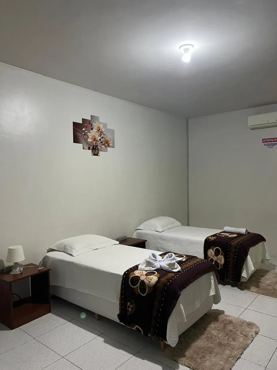 Bed in POUSADA ESTRELA DA MANHÃ