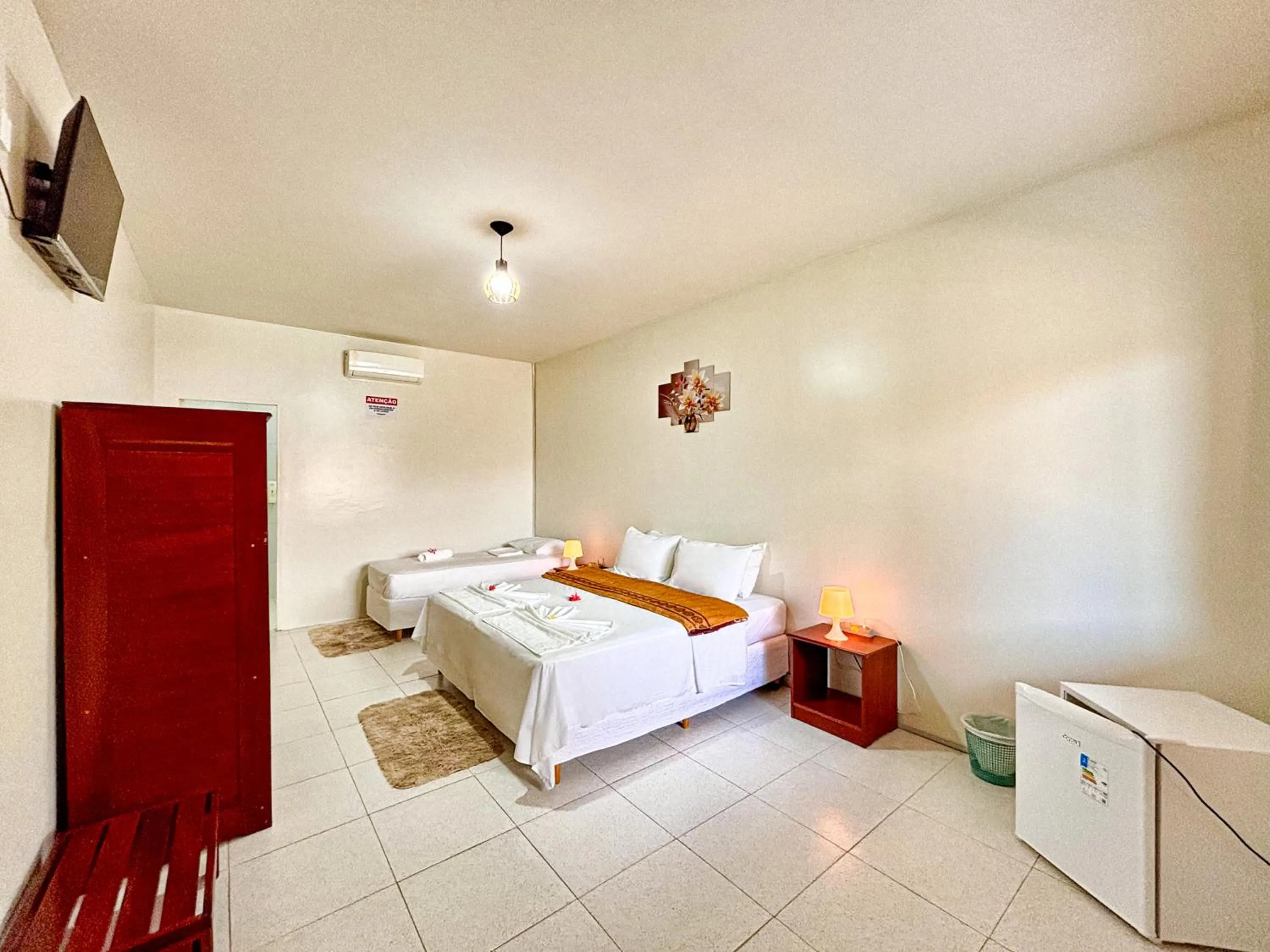 Bed in POUSADA ESTRELA DA MANHÃ