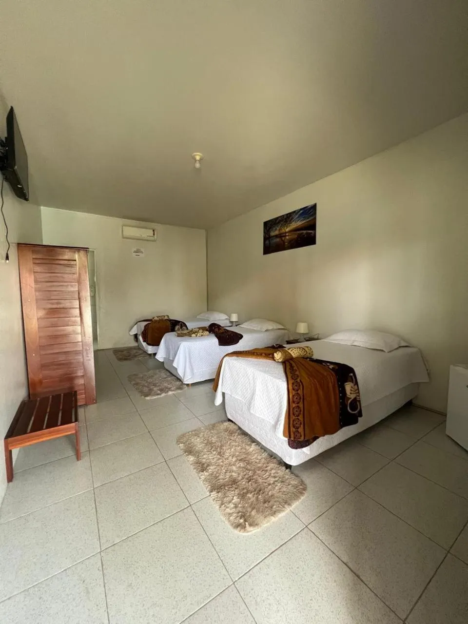 Bed in POUSADA ESTRELA DA MANHÃ