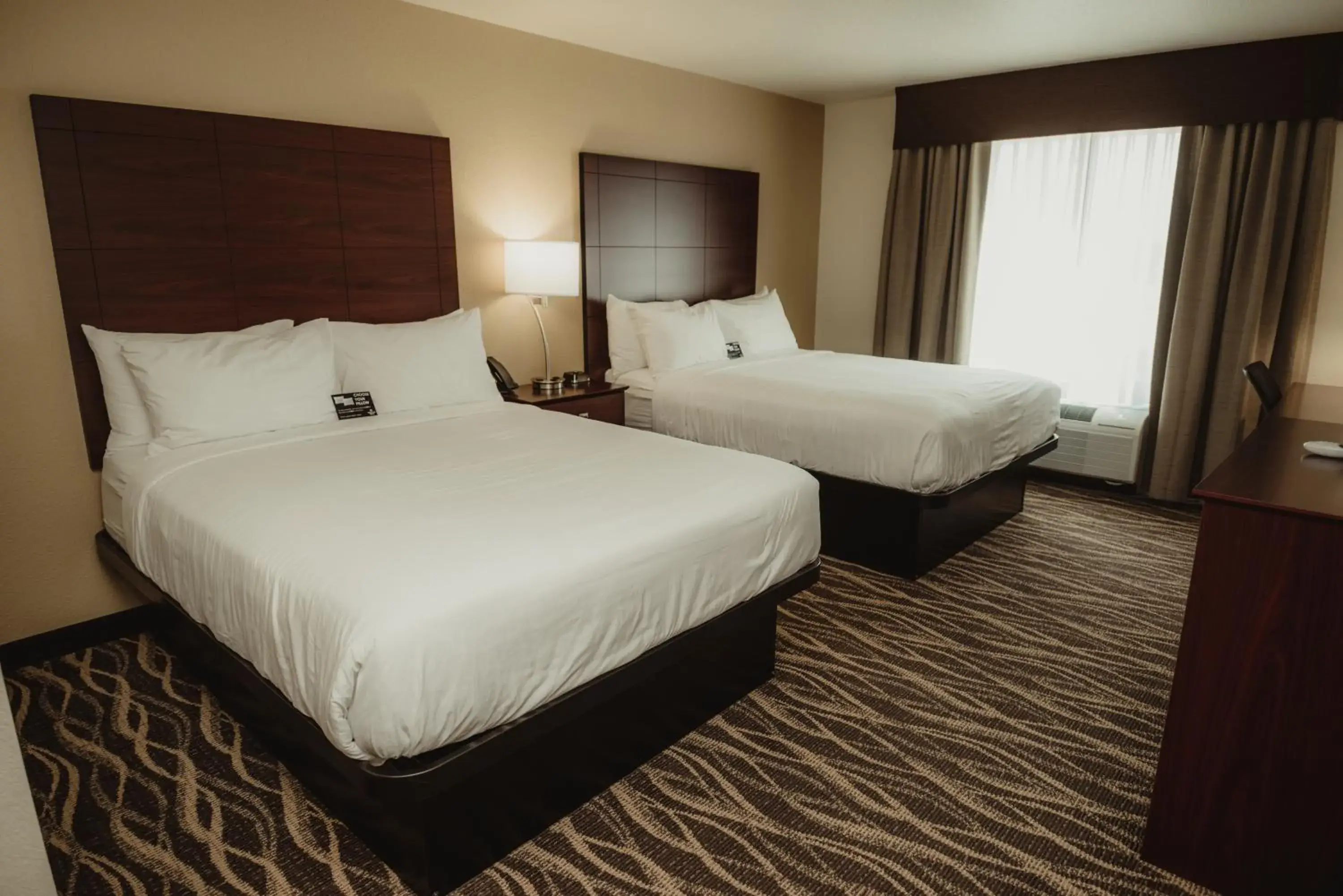 Bedroom, Bed in Cobblestone Hotel & Suites - Ottumwa Bedroom, Bed in Cobblestone Hotel & Suites - Ottumwa