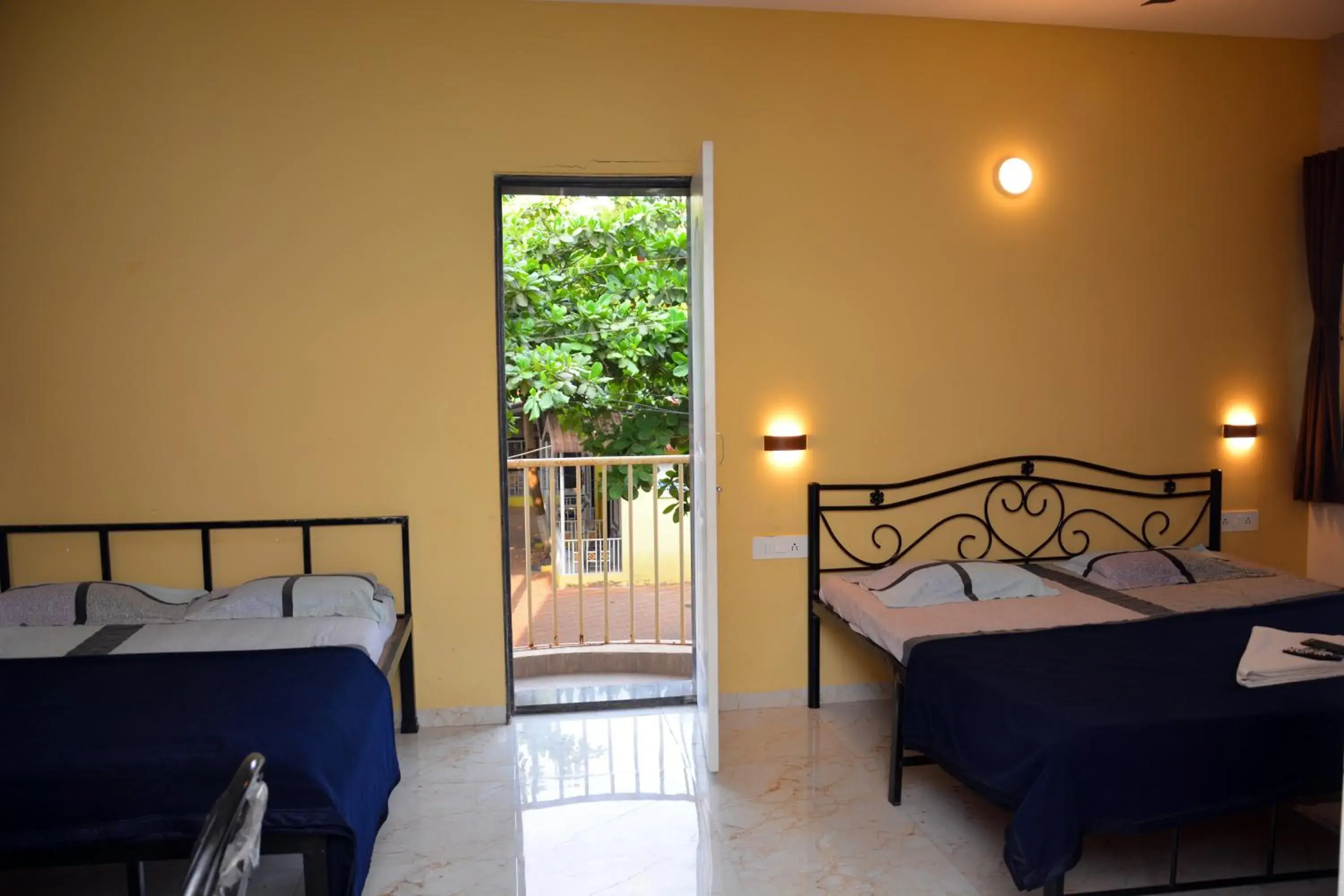 Quadruple Room with Balcony in Shree Swami Samarth Resort Quadruple Room with Balcony in Shree Swami Samarth Resort