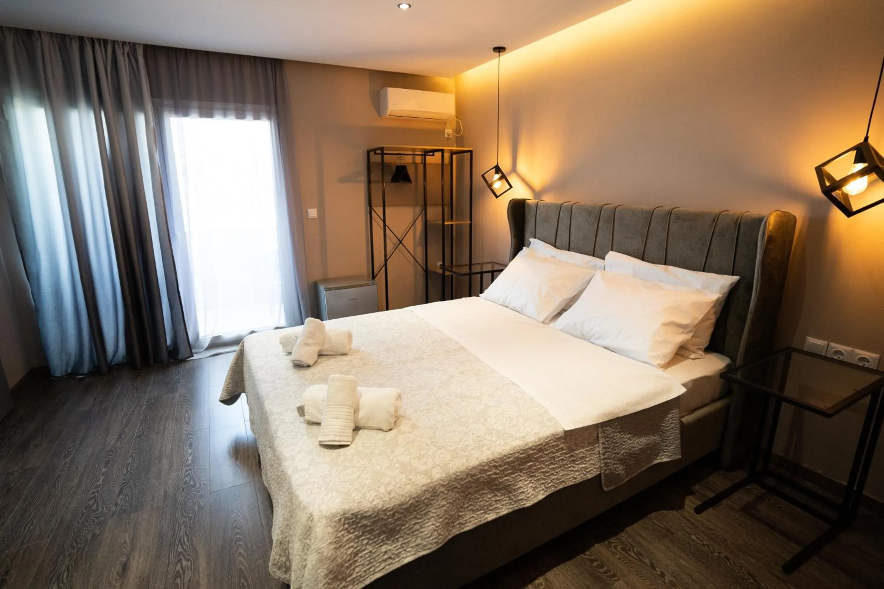 Bed in Parthenis Riviera Hotel