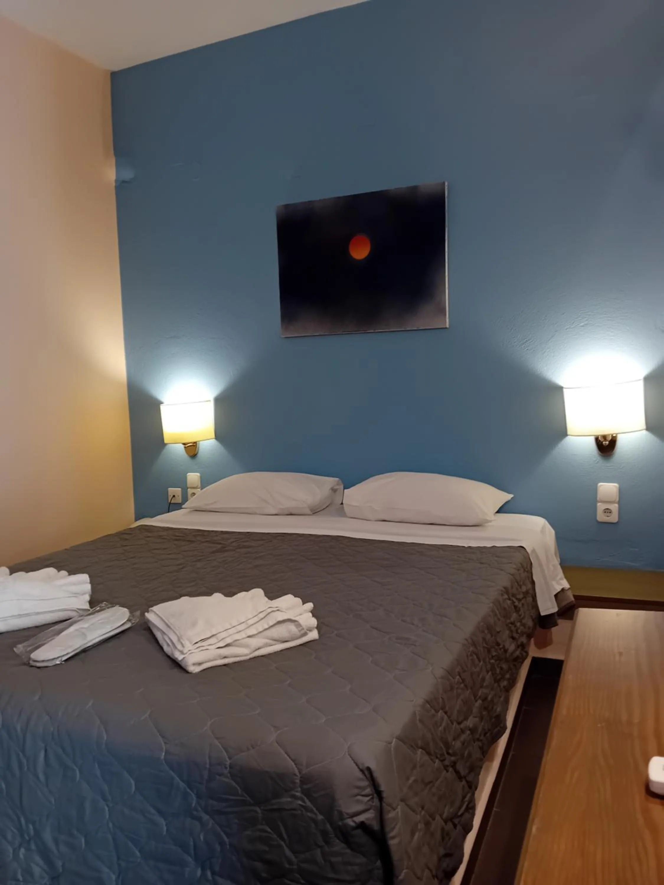 Bed in Heliotopos Apartments