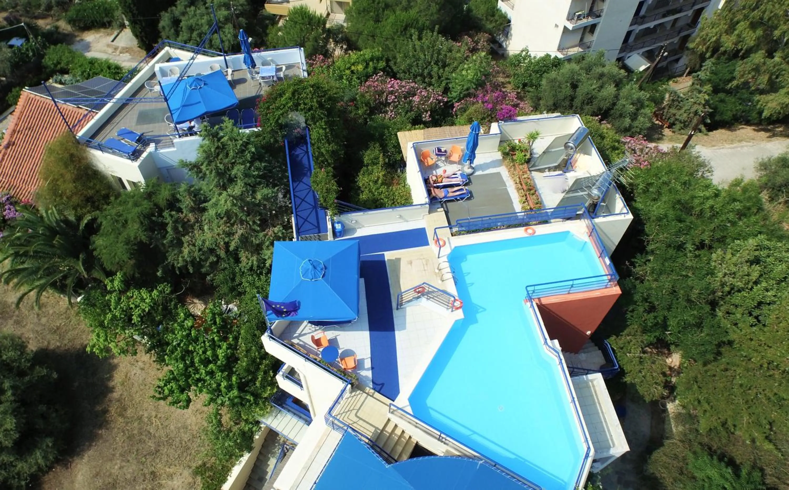 Swimming pool in Heliotopos Apartments