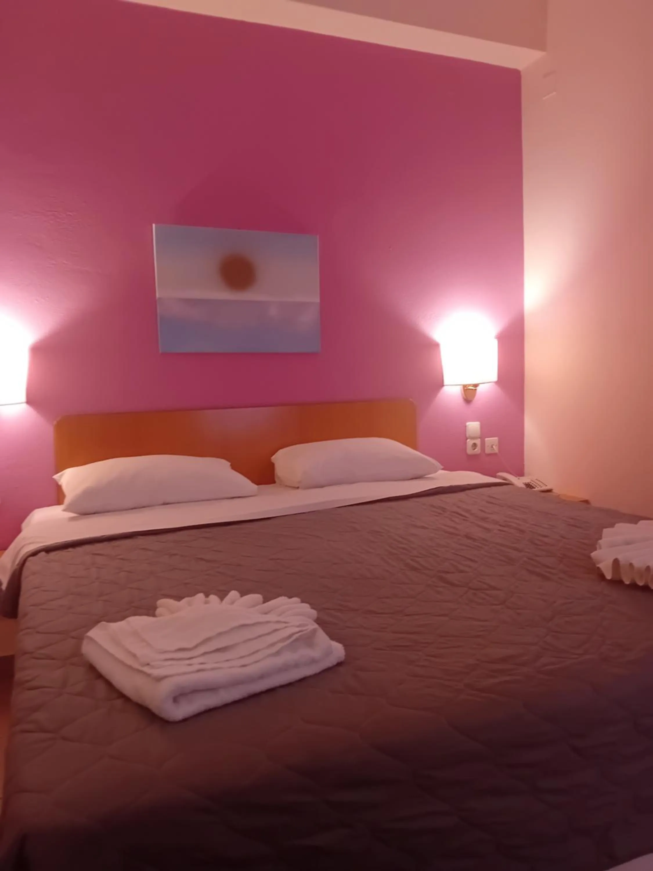 Bed in Heliotopos Apartments