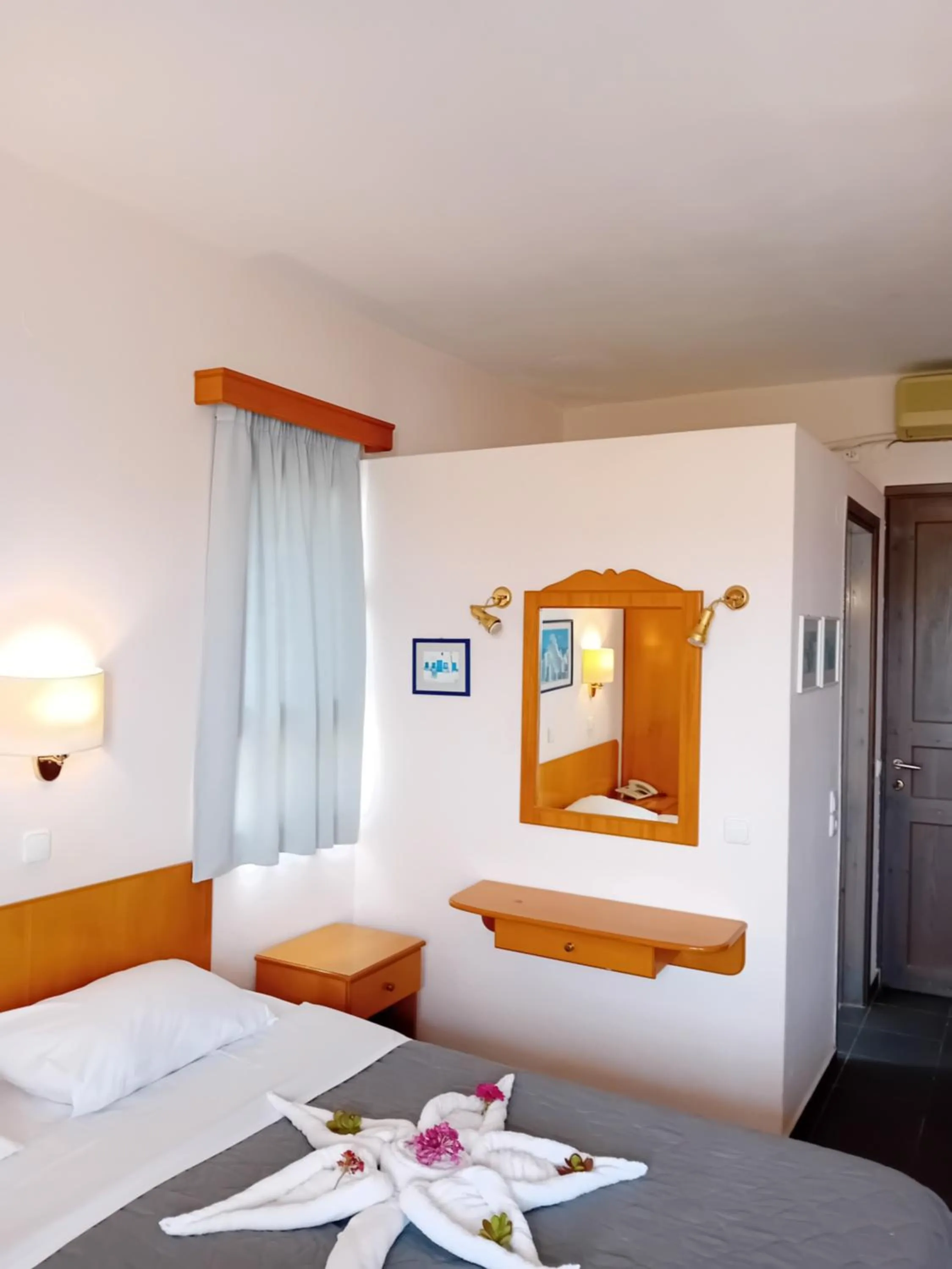 Bed in Heliotopos Apartments